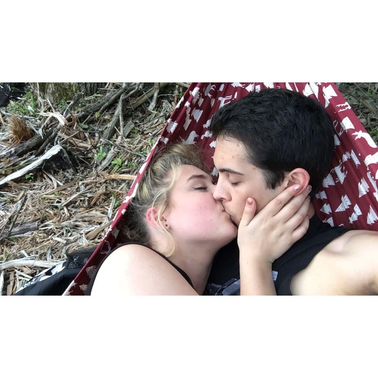 During the summer going into my senior year in high school. Jon-Jon and I went to Costco and bought these Christmas sheets that were on clearance. We made a hammock out of it to laze it for the day.
