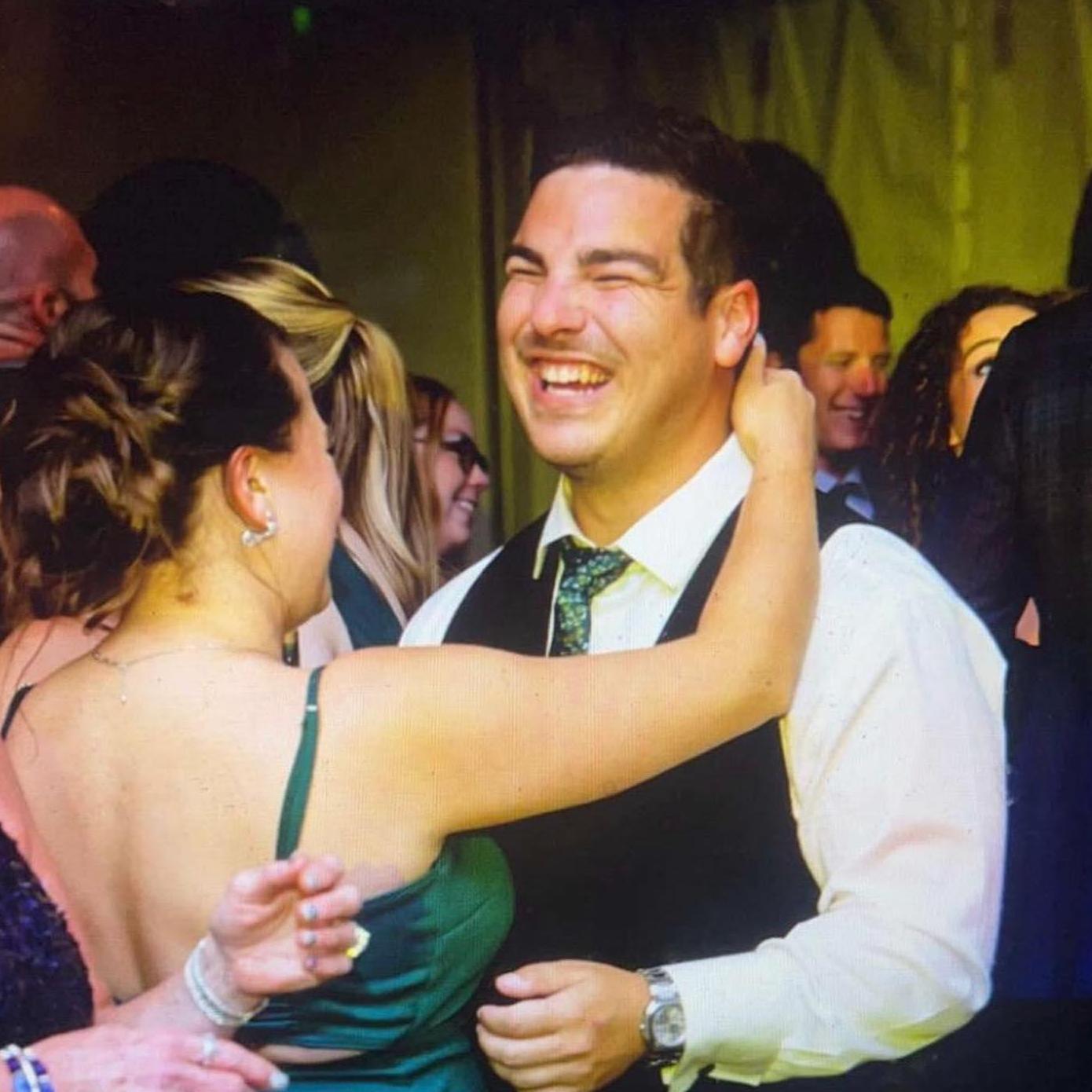 Dancing and laughing at Kevin and Jenn Peck's wedding