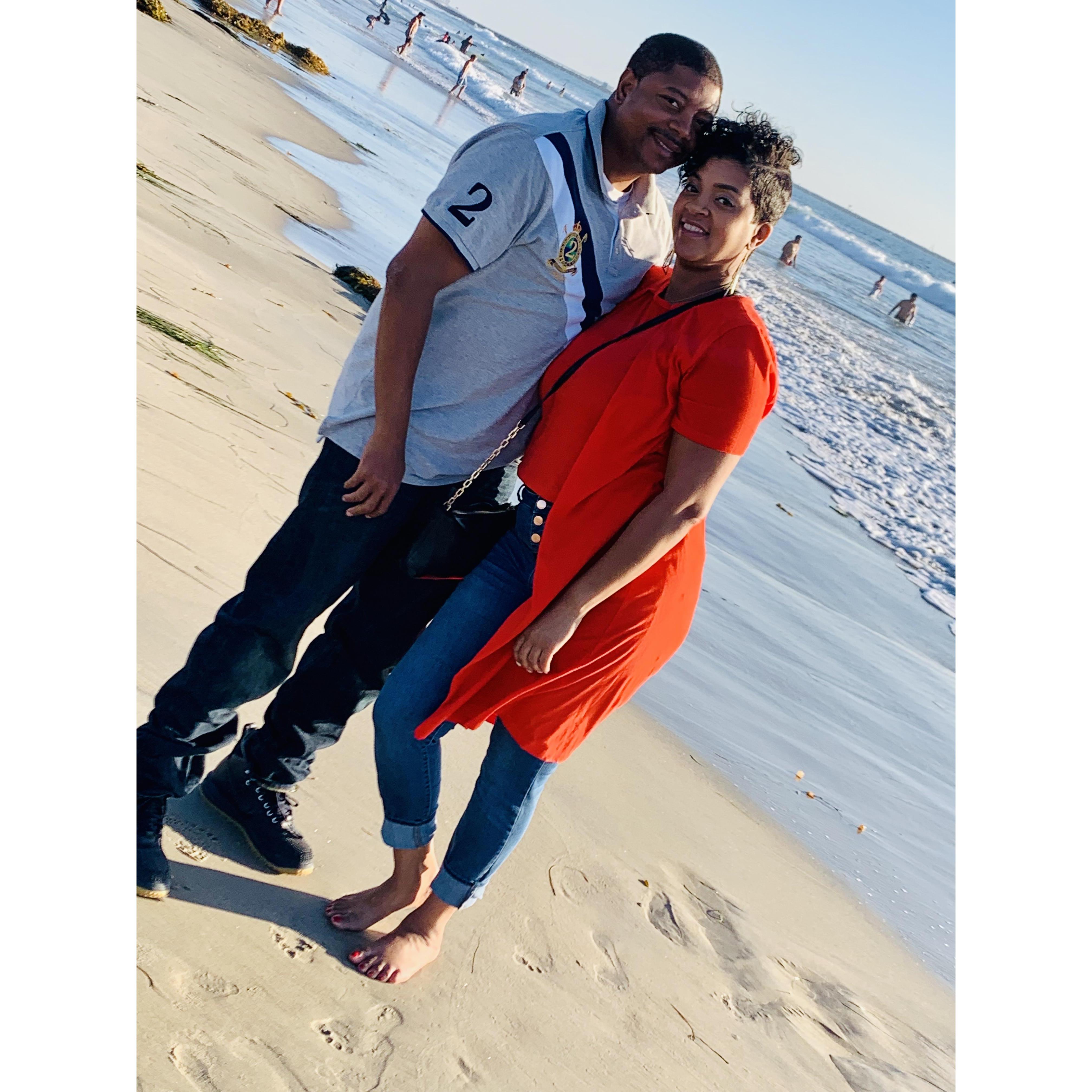 Hand in hand, toes in the sand!