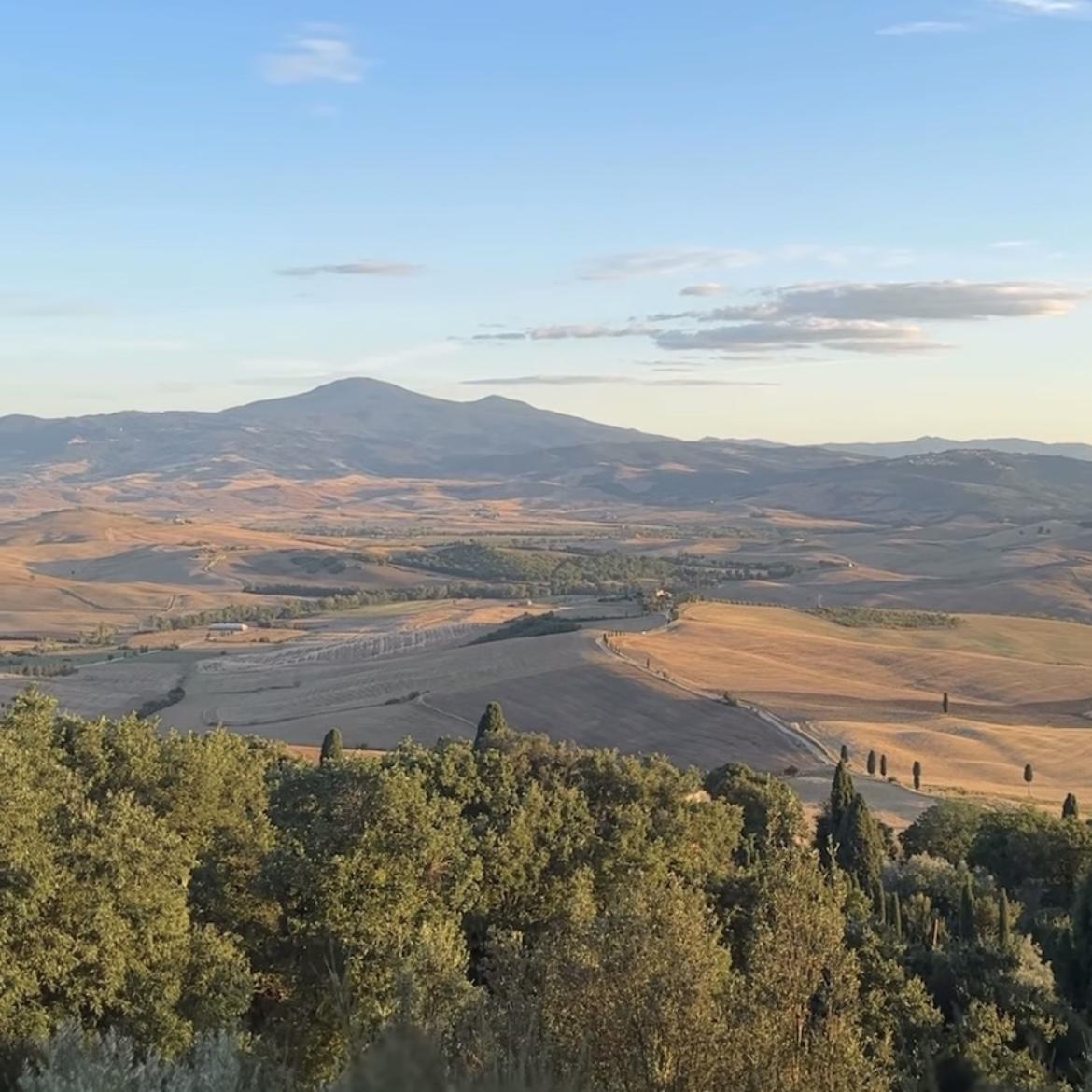 Where the sky meets the hills, Tuscany unfolds in every shade of gold.