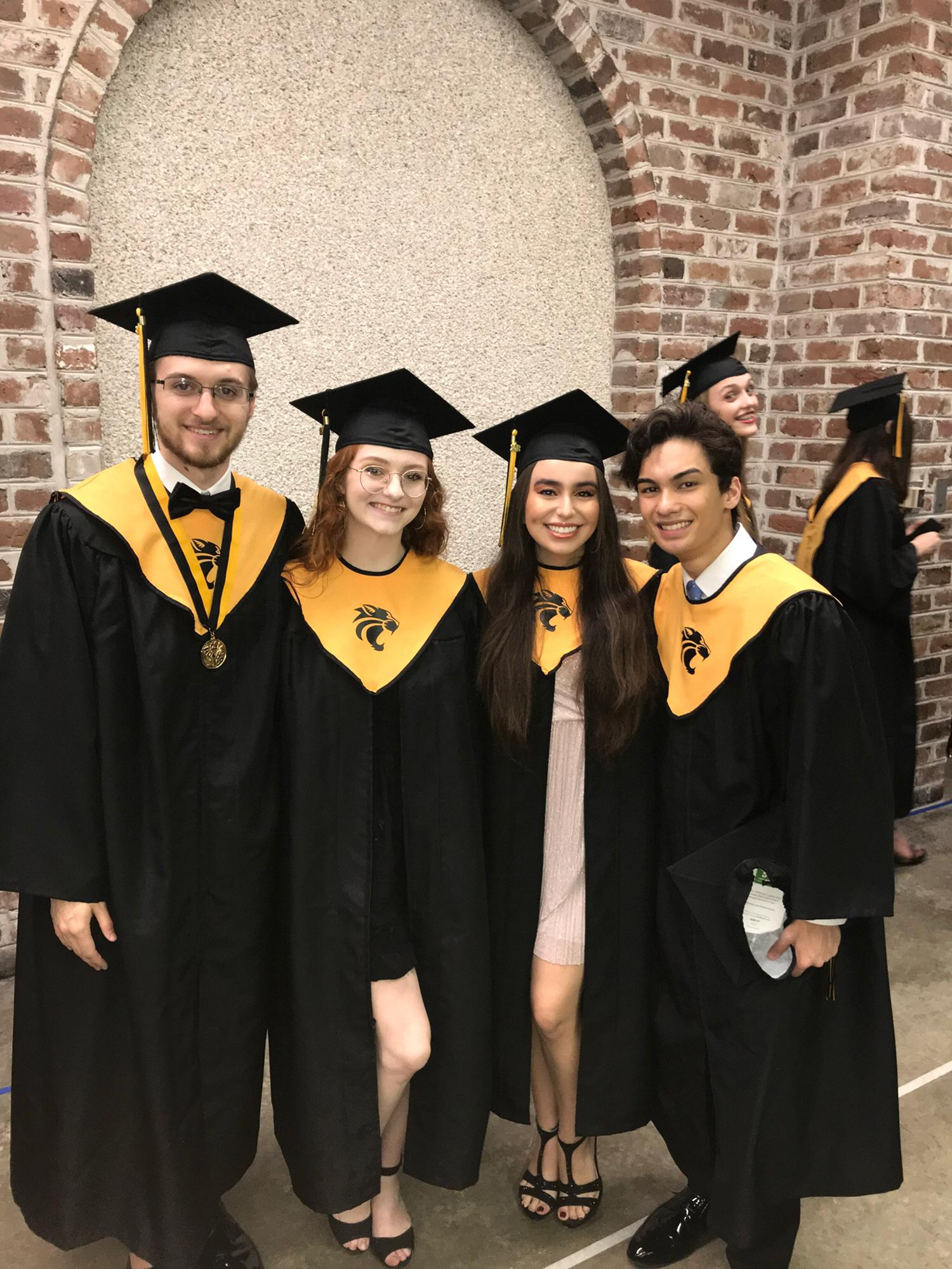 High School Graduation ( along with Erika and Nathan on the left!)