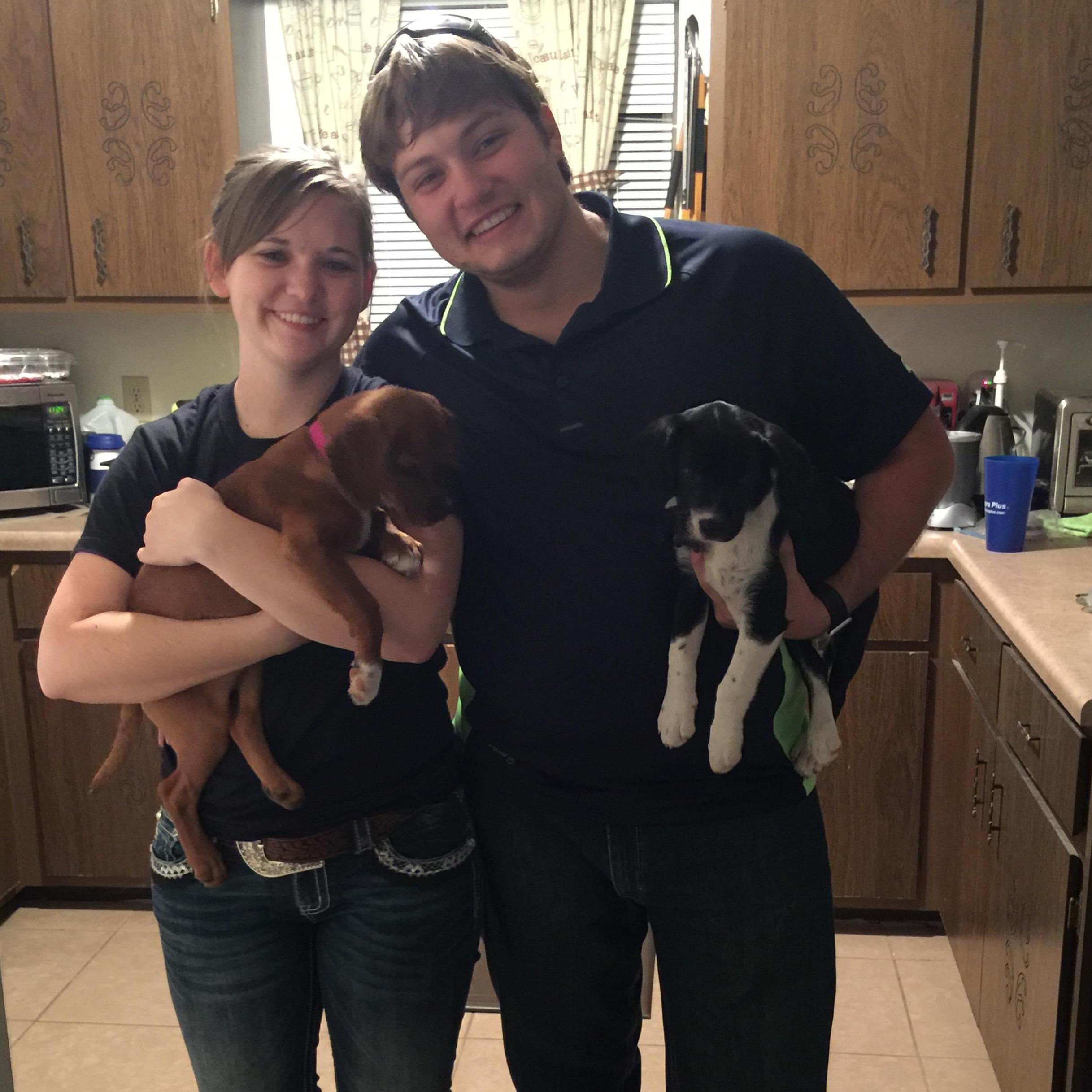 When Torrie first met the puppies Penny and Guinness