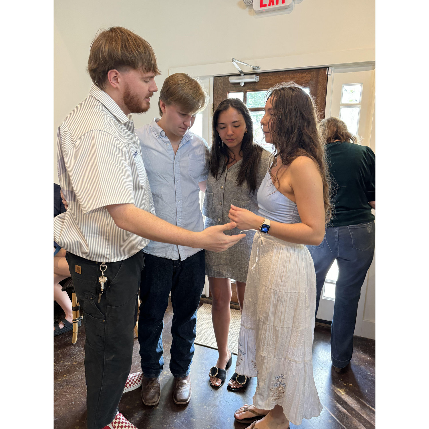 At our engagement party, with our best friends.