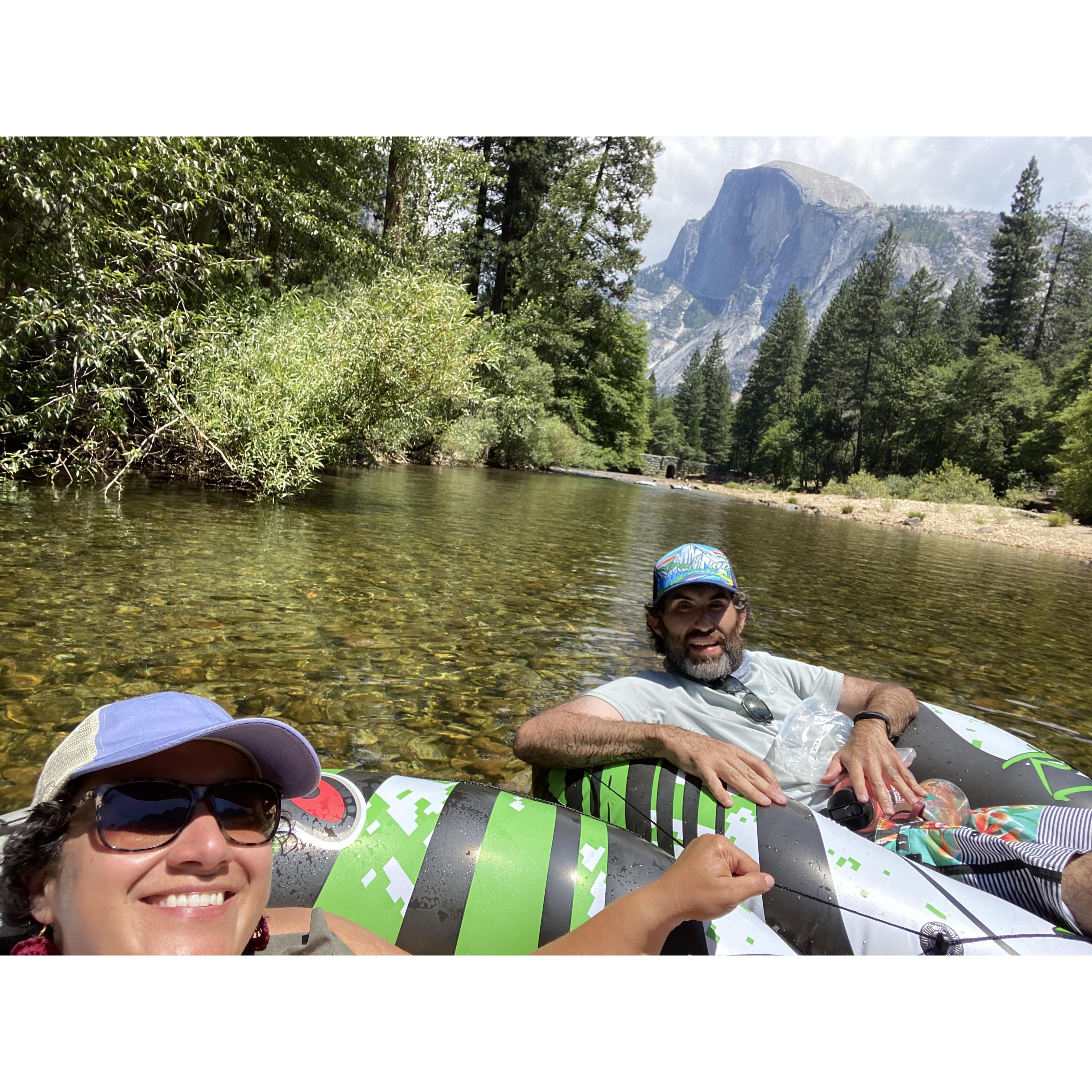 Floating down the Merced River with a view of Half Dome.