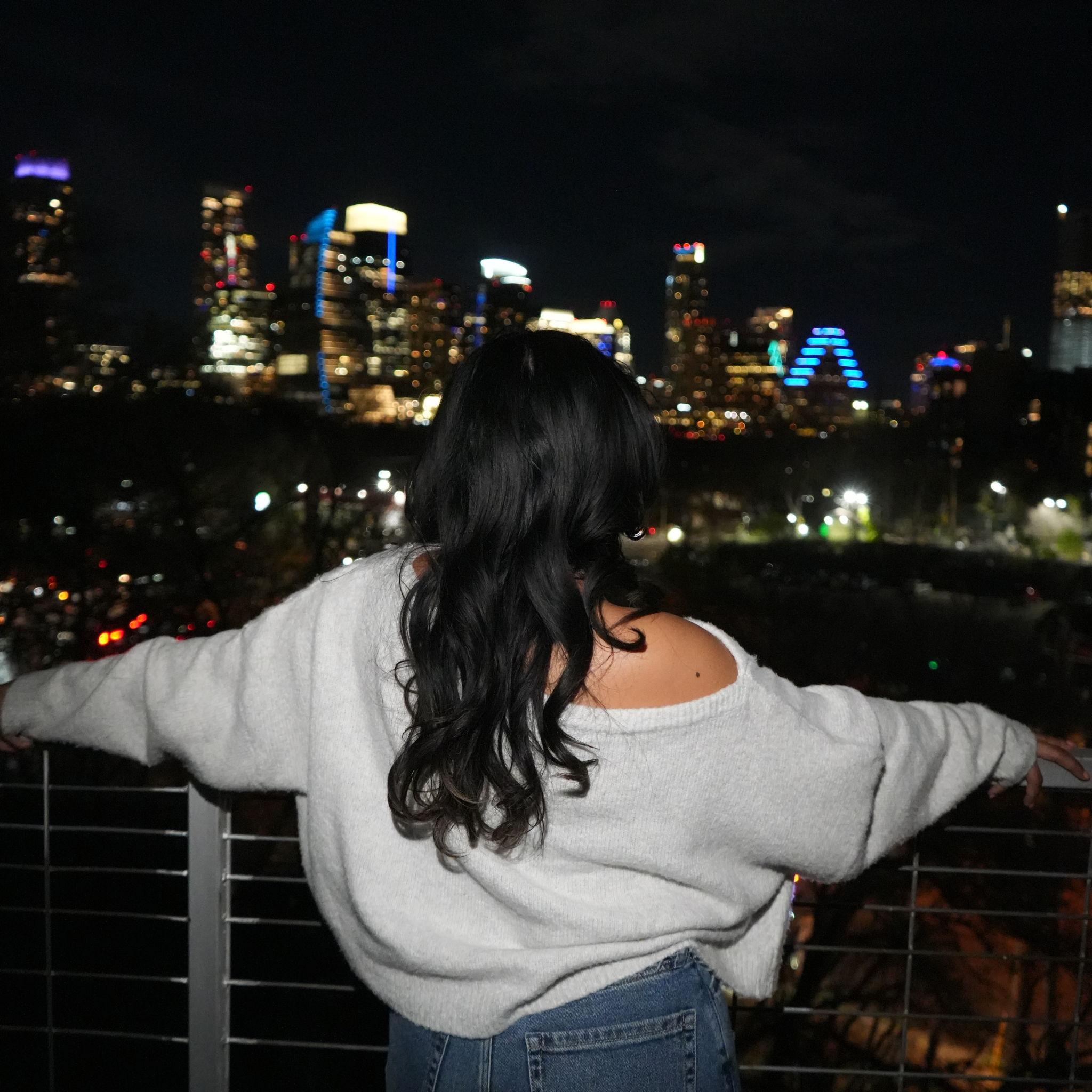 1/2/26: Nate told Jackie he wanted to get a picture of her facing the skyline, he tricked her, took this picture, then got down on one knee before she turned around!
