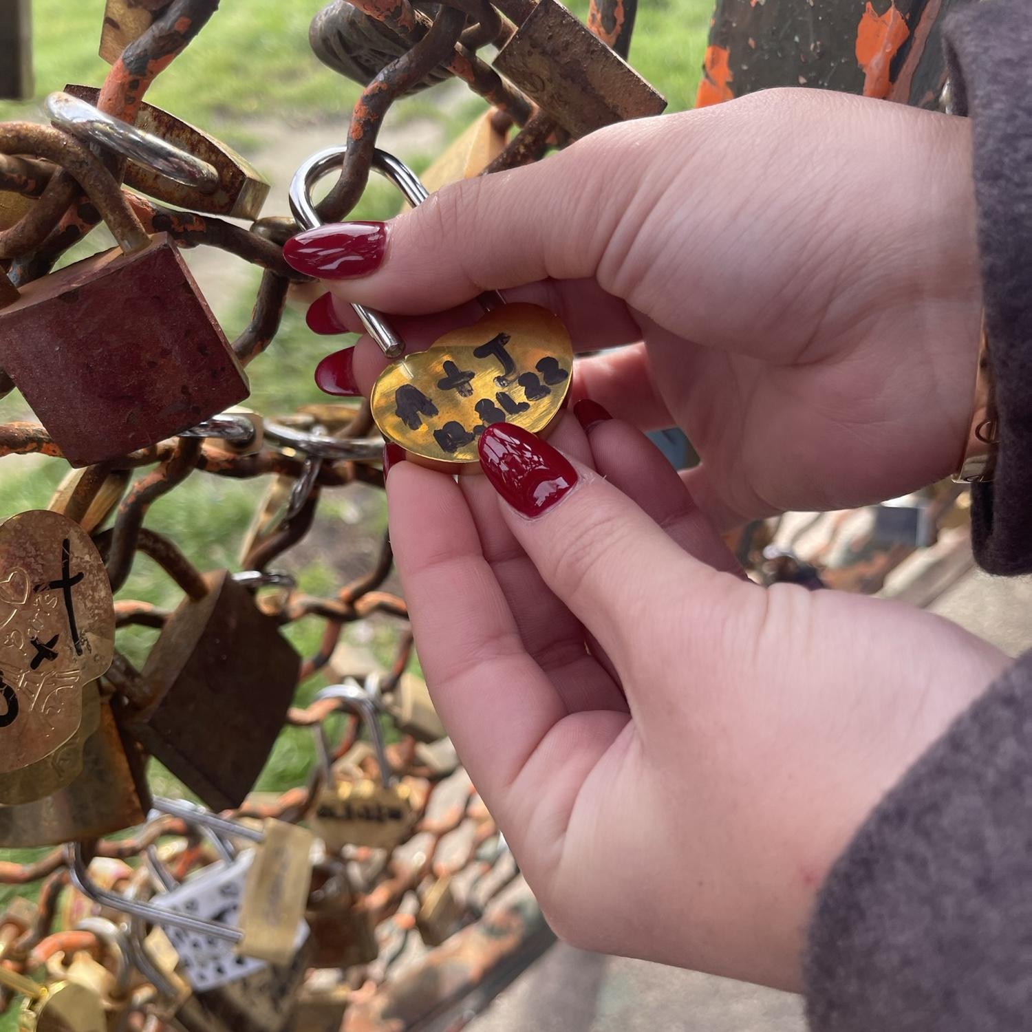 Our love lock in Montmartre, Paris. The locks represent thousands of love stories from couples around the world!
