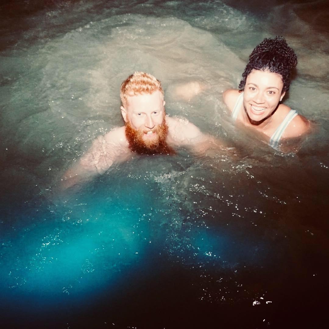 Swimming in florescent lagoon in Jamaica