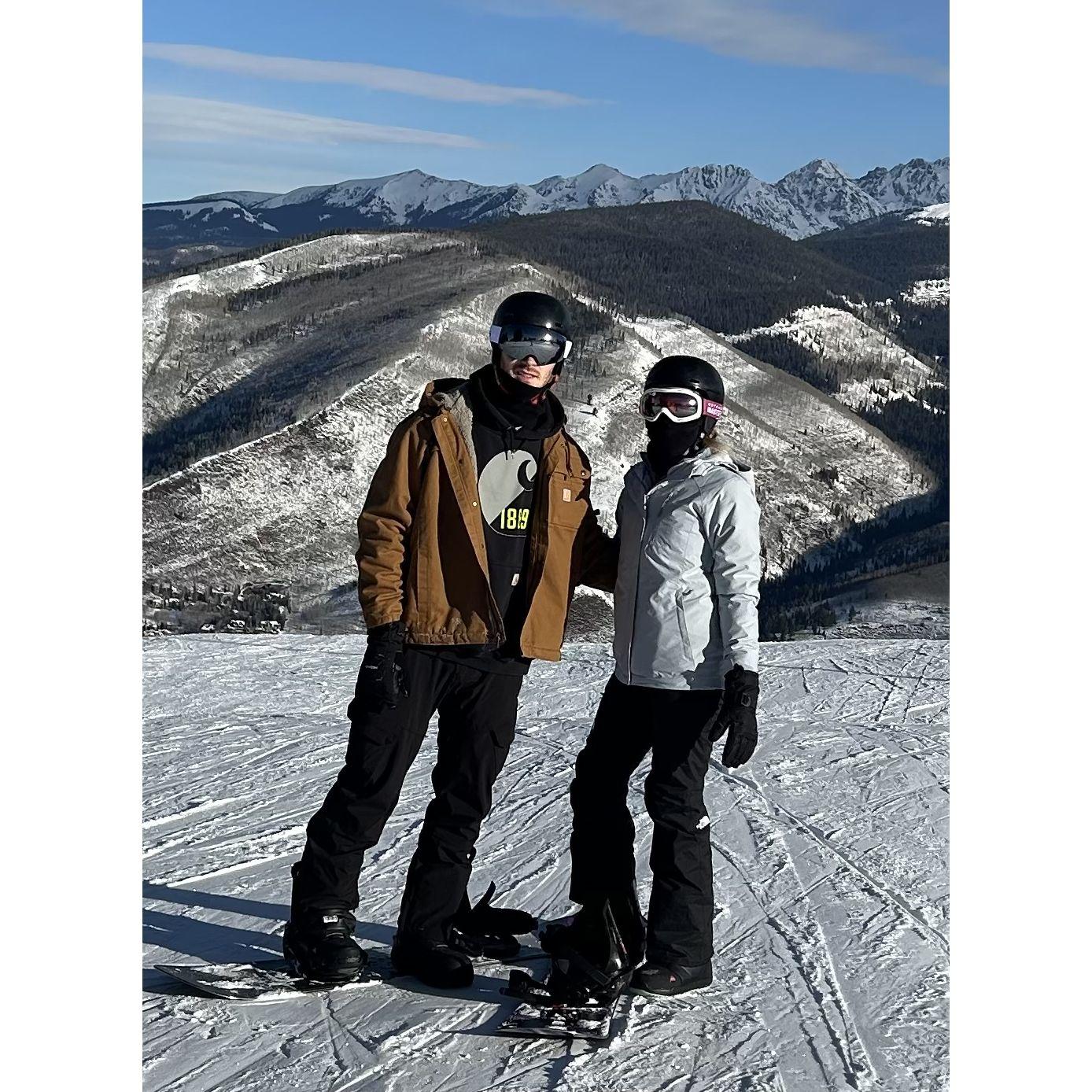 The day of our proposal, we went snowboarding!