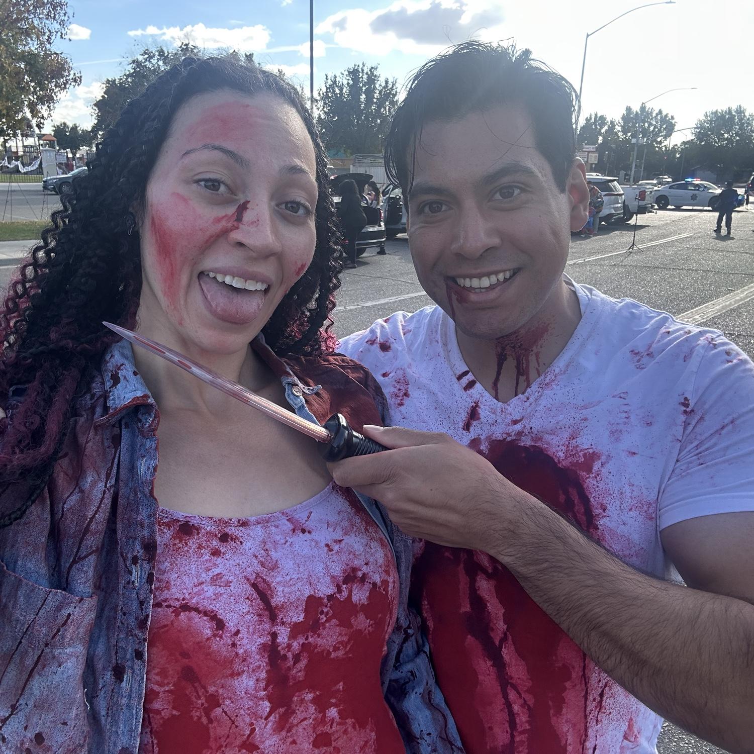 Halloween trunk or treat, dressed as Sidney and Billy from Scream