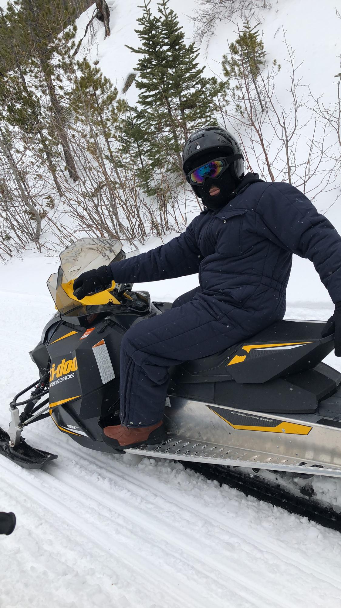 Colorado:
Snowmobile through the mountains