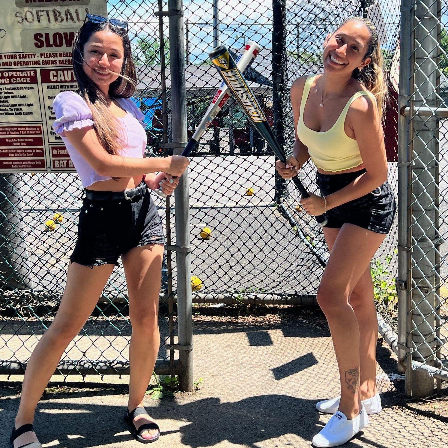 Jackie and her sister (and Maid of Honor) Jasmin getting ready for the batting cages. Note: Neither of them like baseball.