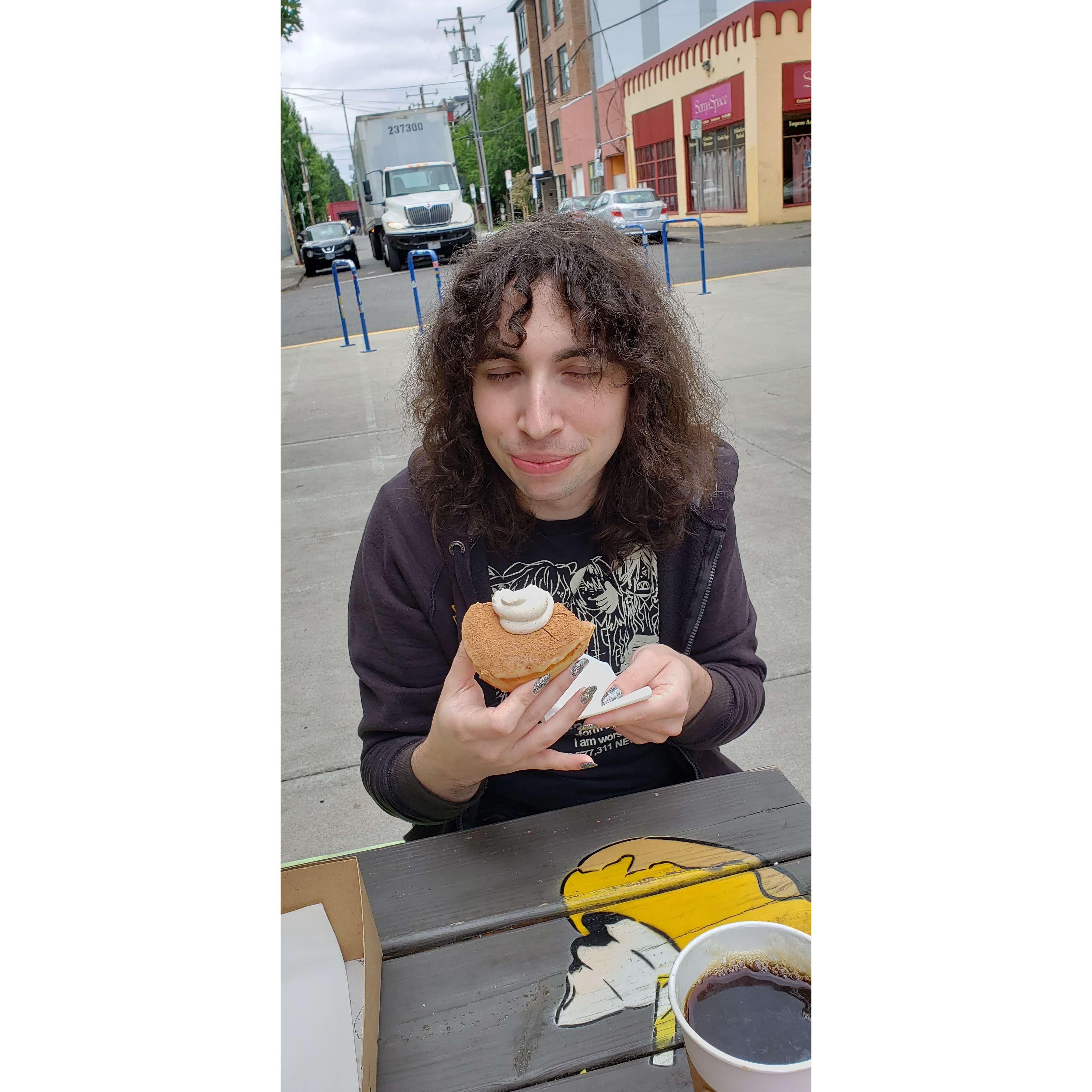 Yara enjoying their first vegan donut on the west coast