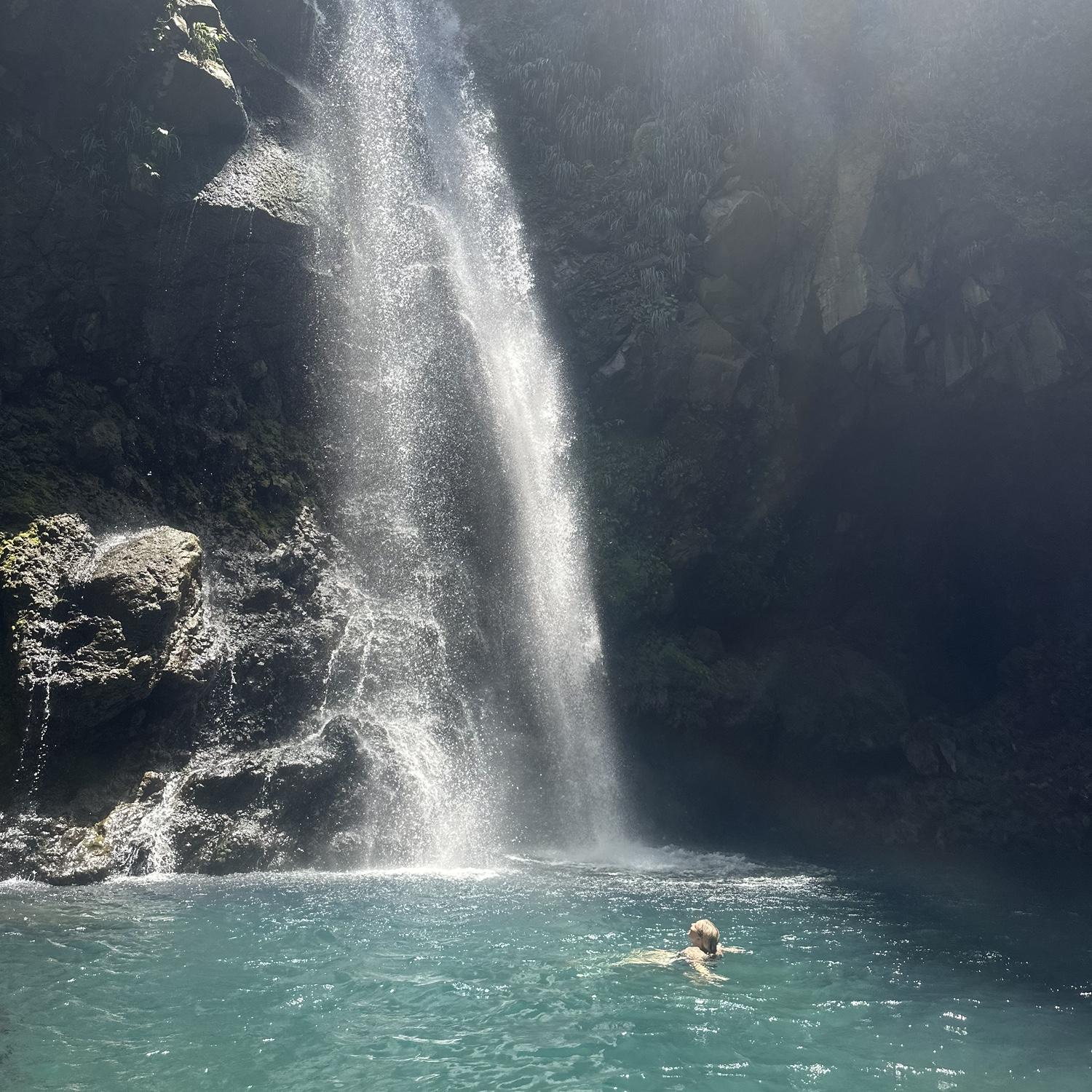 Camille enjoying the beautiful falls in Saint Vincent during her first trip