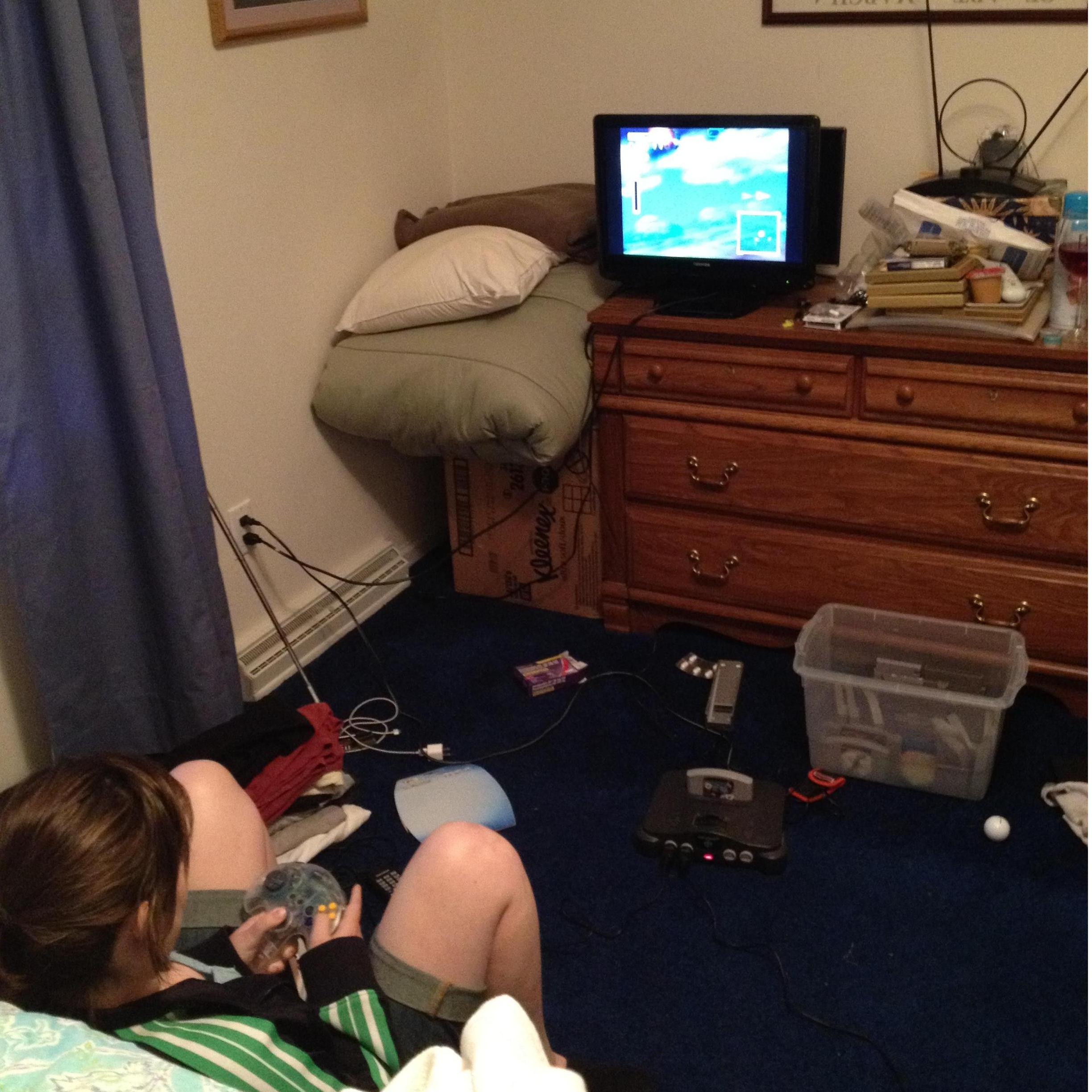 Evan teaching me how to play StarFox. (2011)