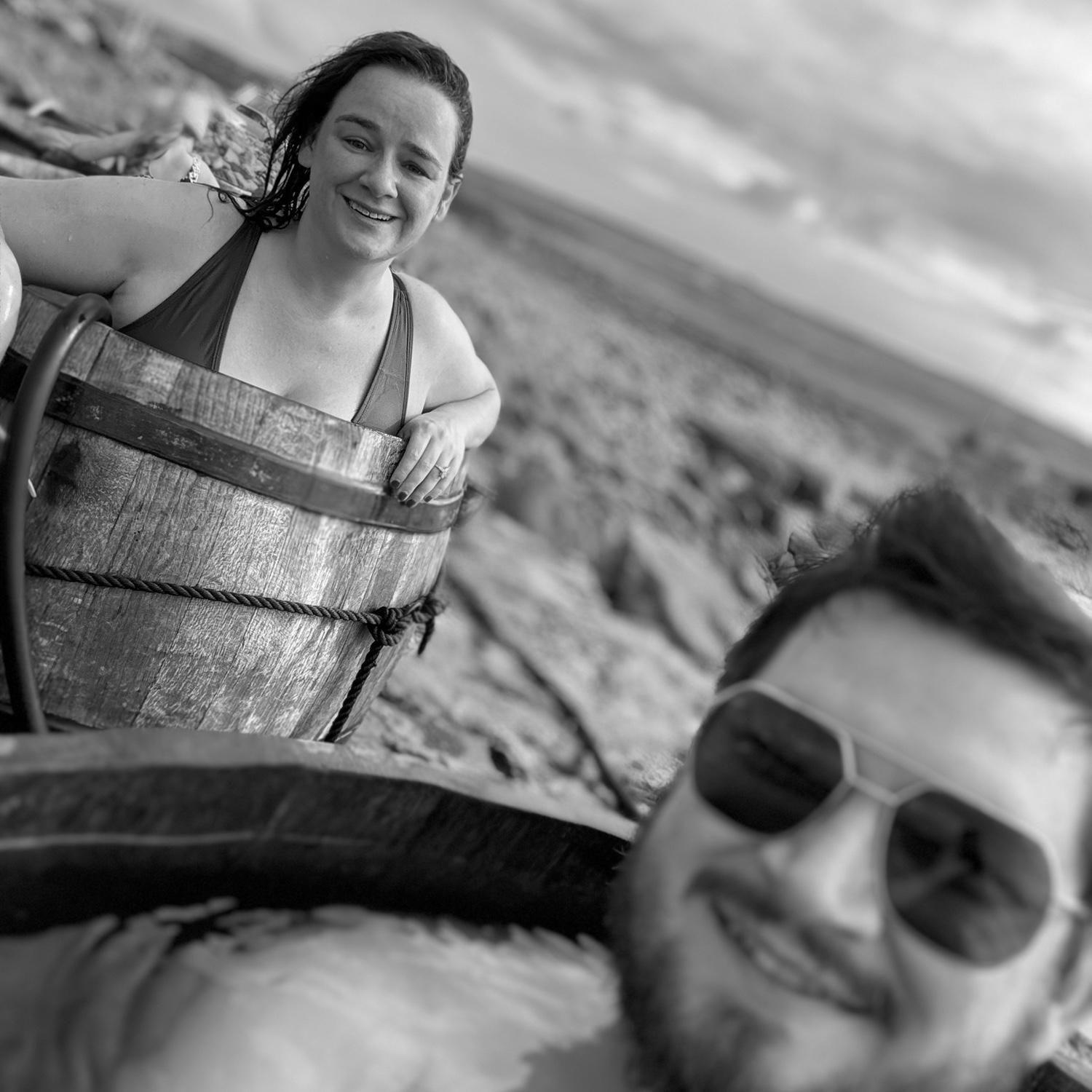 Dave & Millie bathing in barrels on the Atlantic ocean.