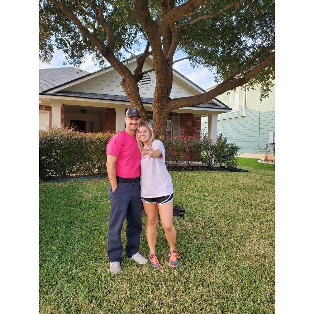 Us holding the key to our first home together!