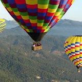 Balloons Above the Valley