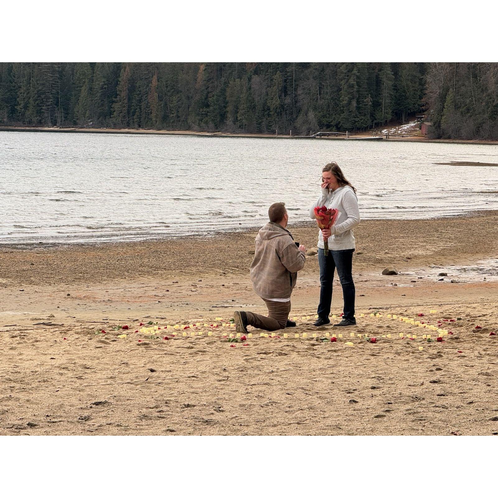 November 29, 2024 - Jack Proposed!!! He took me on a surprise trip up to Elkin's Resort where he rented one of their cabins for the weekend. He had our friends, Winter and Kyle go up there ahead of time to set the whole thing up. Right when we got there, he took me to the bridge that he had lined with candles and roses, and then along a path (also lined with candles), that led to the beach where he had more candles and roses set up in the shape of a heart. He led me into the middle of the heart and proposed to me on the beach!! It was the most magical, pinterest-perfect proposal I could've ever imagined! Obviously, I said YES! He took me to dinner after and we spent the rest of the weekend relaxing in the cabin.