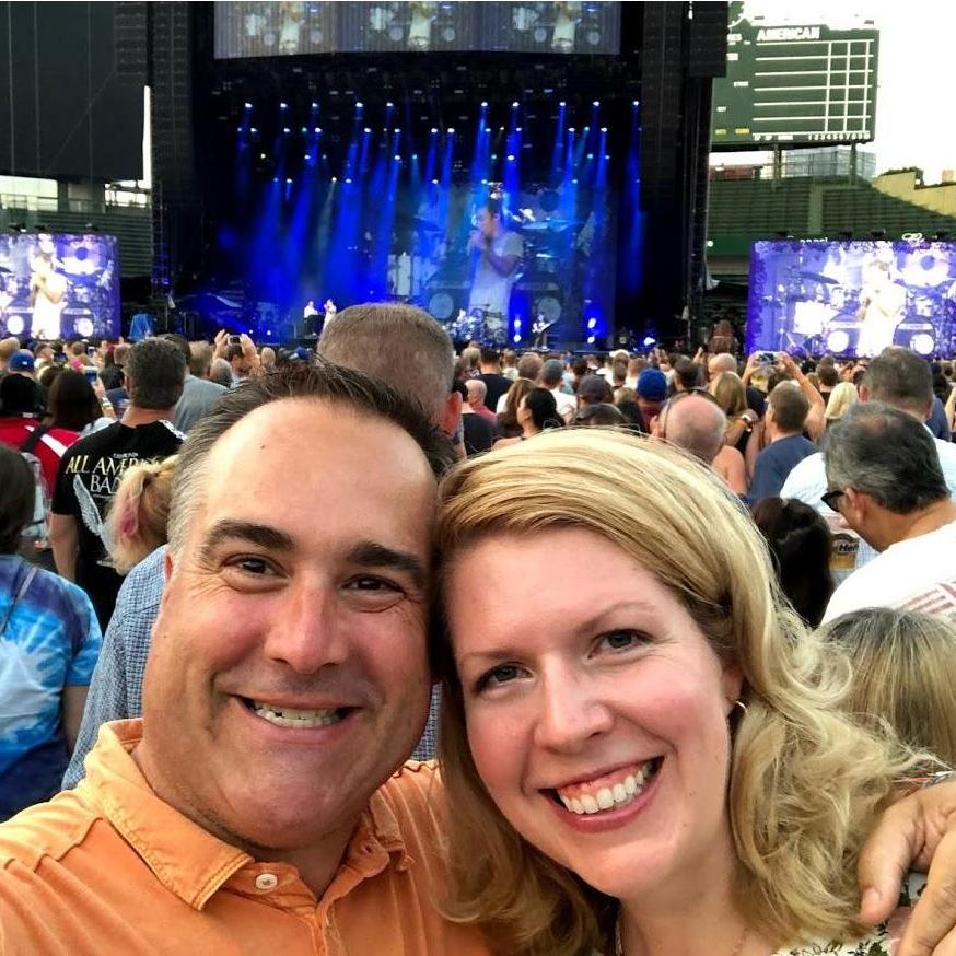 Our heads at a Journey/Def Leppard concert at Wrigley Field.