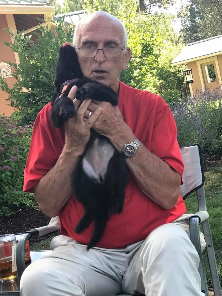 Fred Holmes (grandpa) meeting his newest granddog Lagertha.