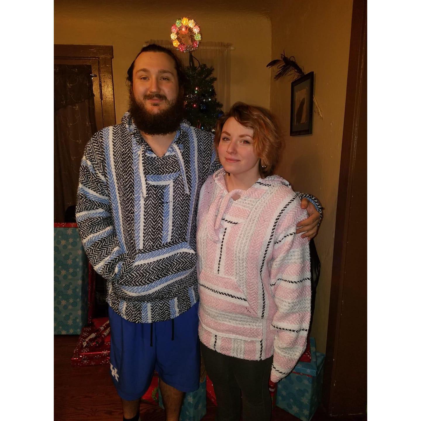 Matching Christmas sweaters.