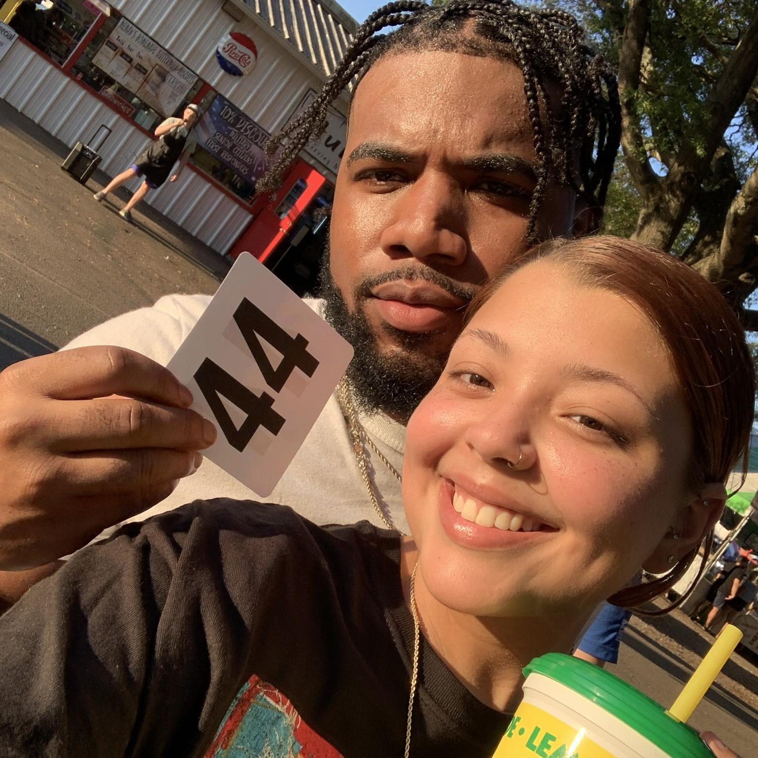 Us at the state fair waiting at our favorite kabob stand! Every year we stop here and get a steak kabob and chicken kabob.