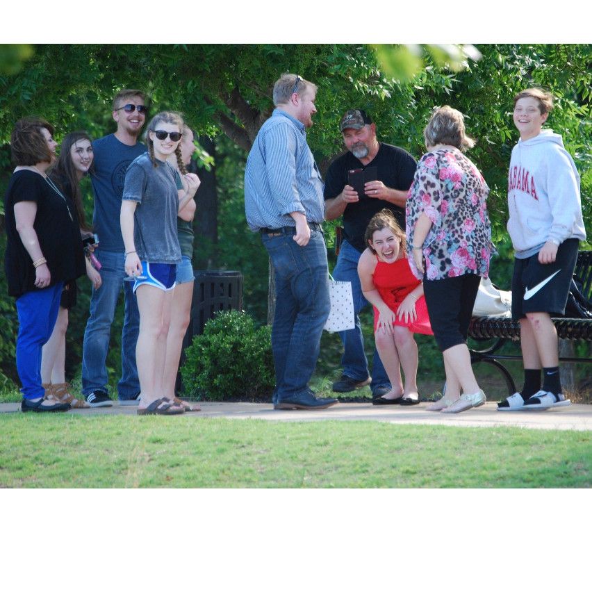 Kayla died laughing when everyone pointed out Scott hiding behind a baby stroller, taking photos.