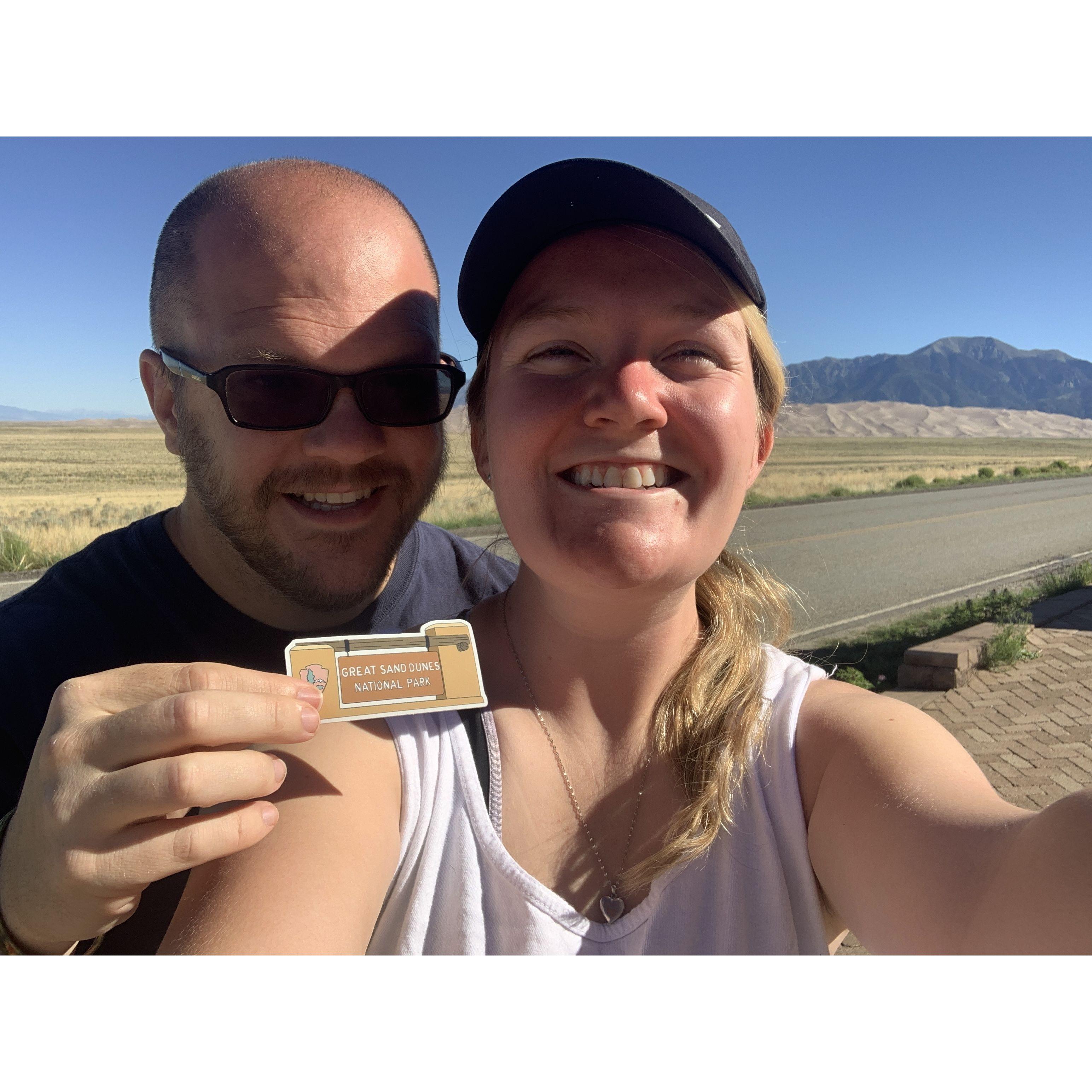 Sledding down sand dunes