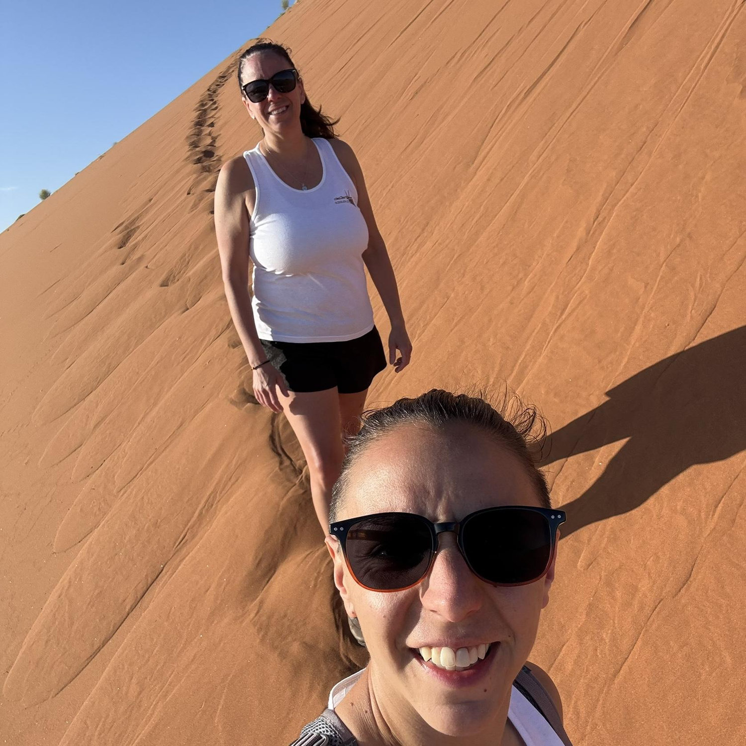 Shoes full of sand, hearts full of joy.