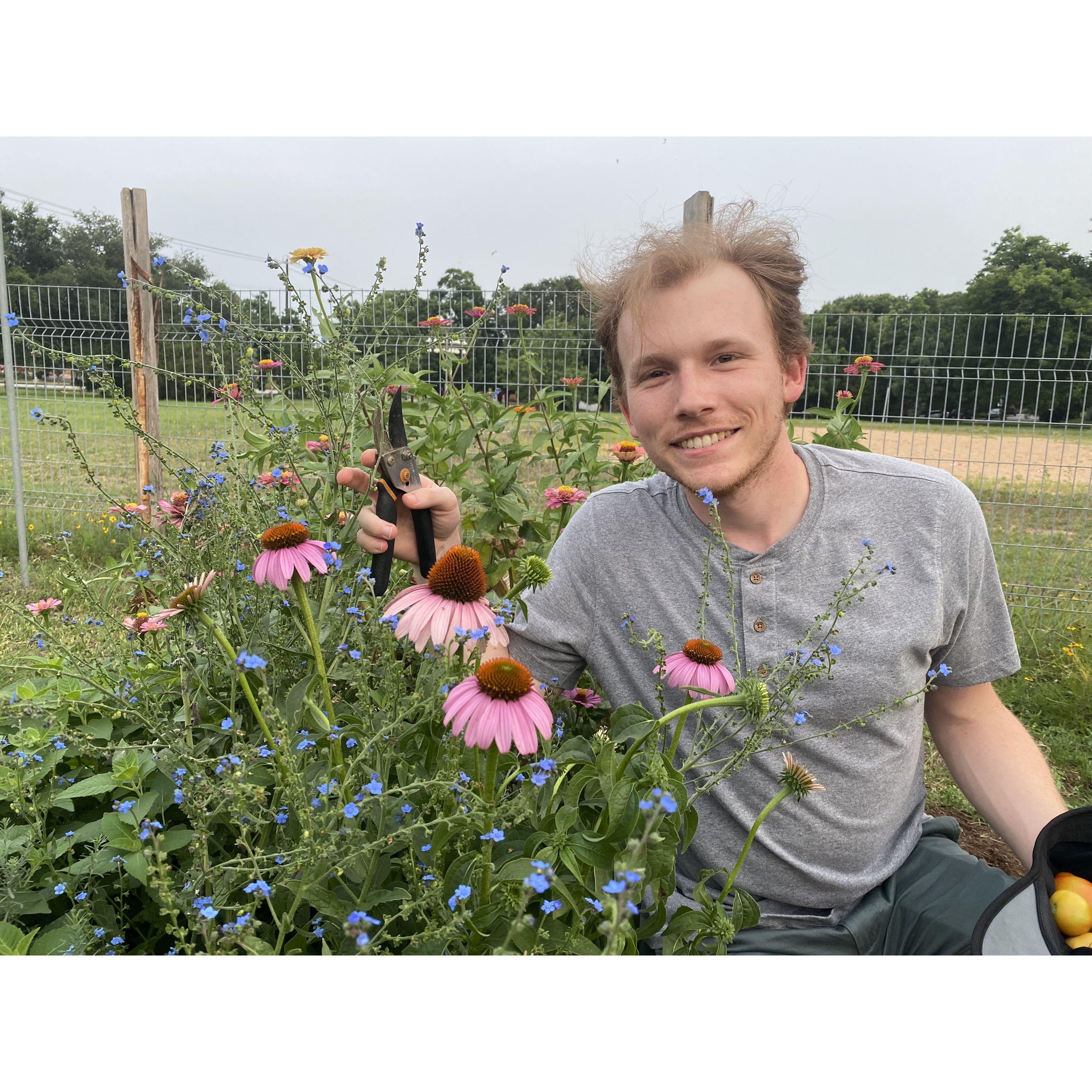 Matthew with the purple cone flowers in our garden - his favorite!