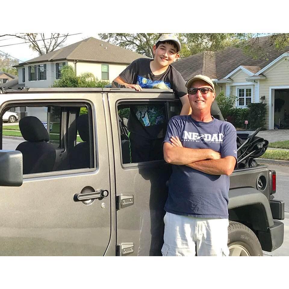 Dad, Ian, and Thunder (the jeep)