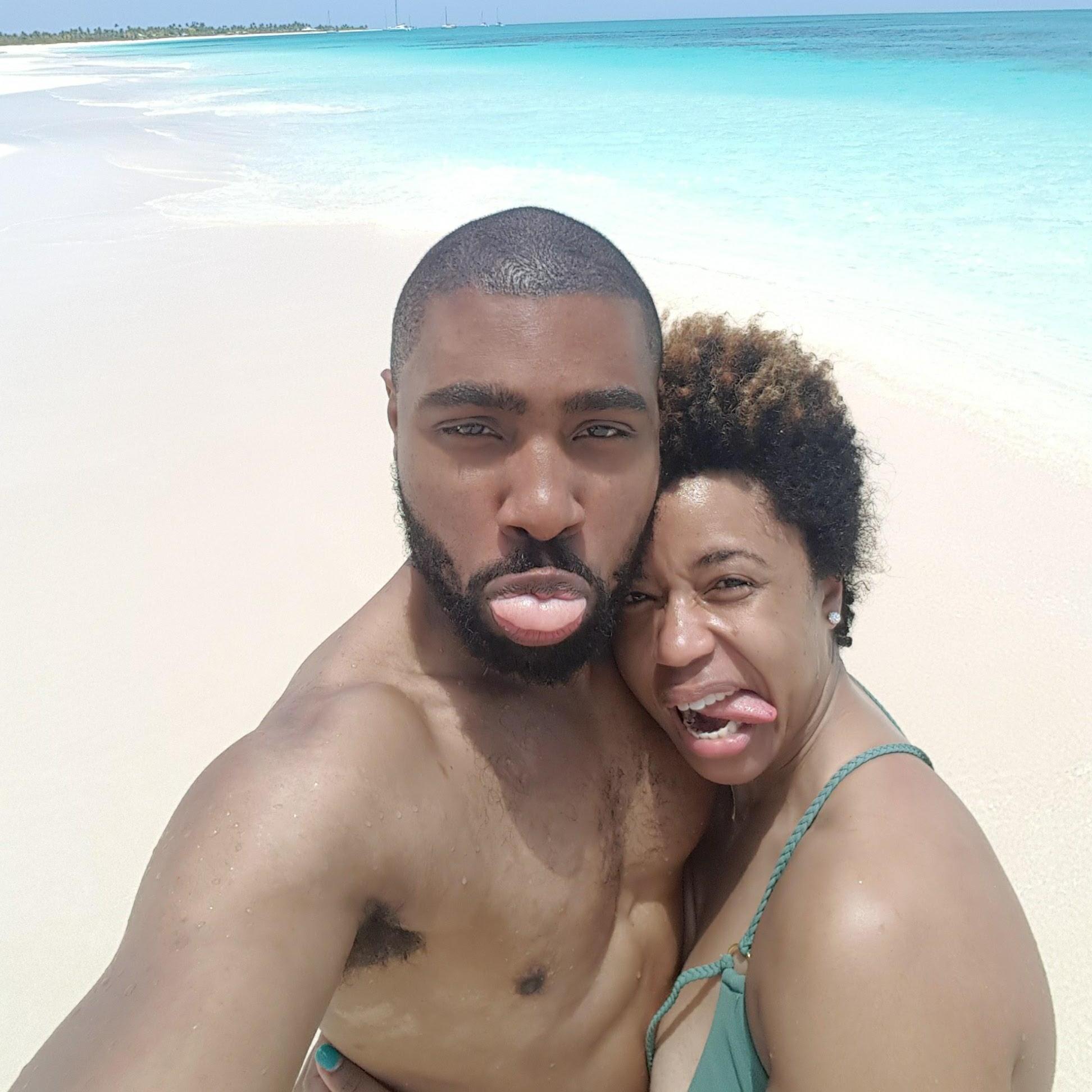 Acting silly and enjoying the beach all to ourselves on the lovely island of Barbuda!