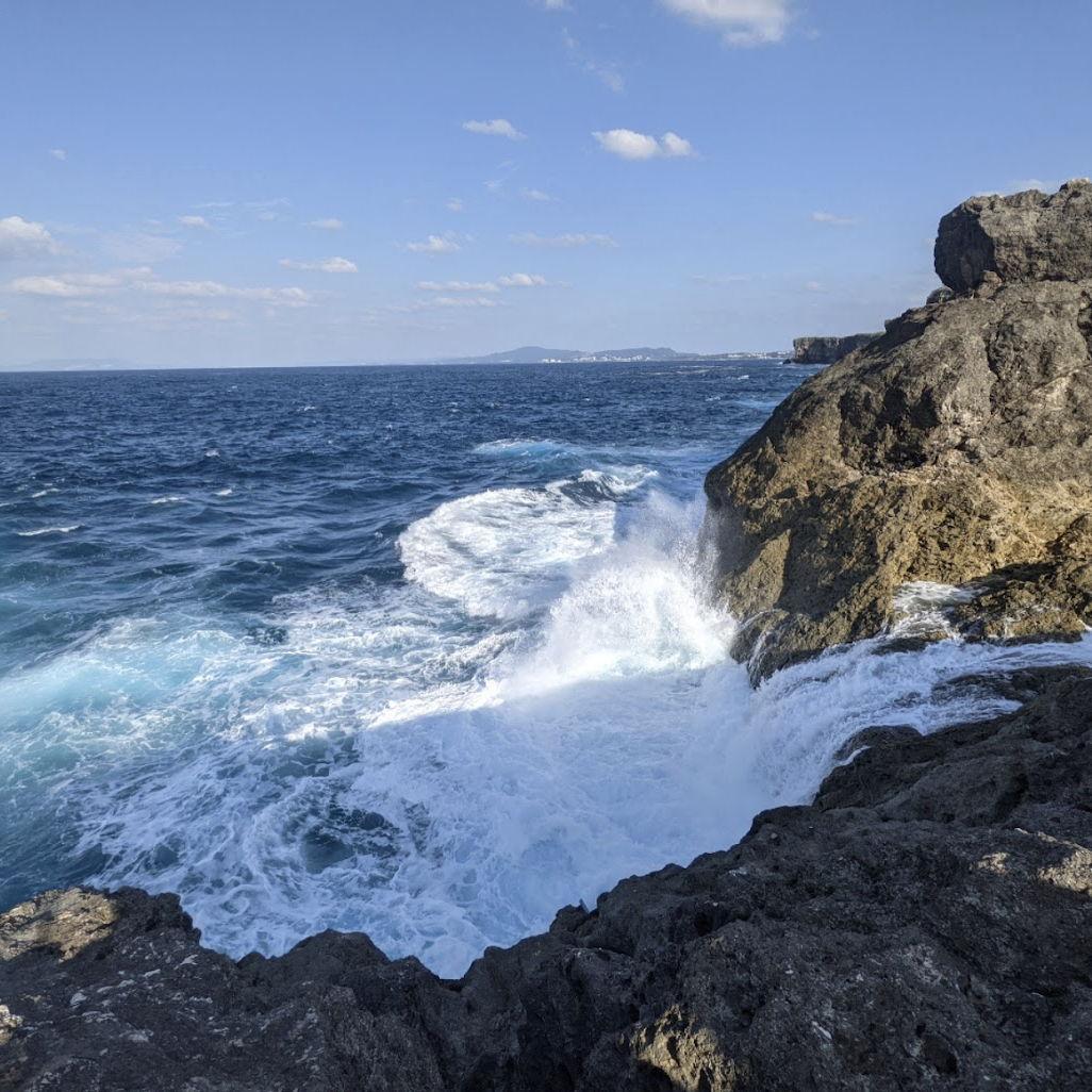 Cecille's favorite lookout point on Cape Zanpa, Okinawa. The water would crash into the cliff and turn icy-blue beneath the foam.