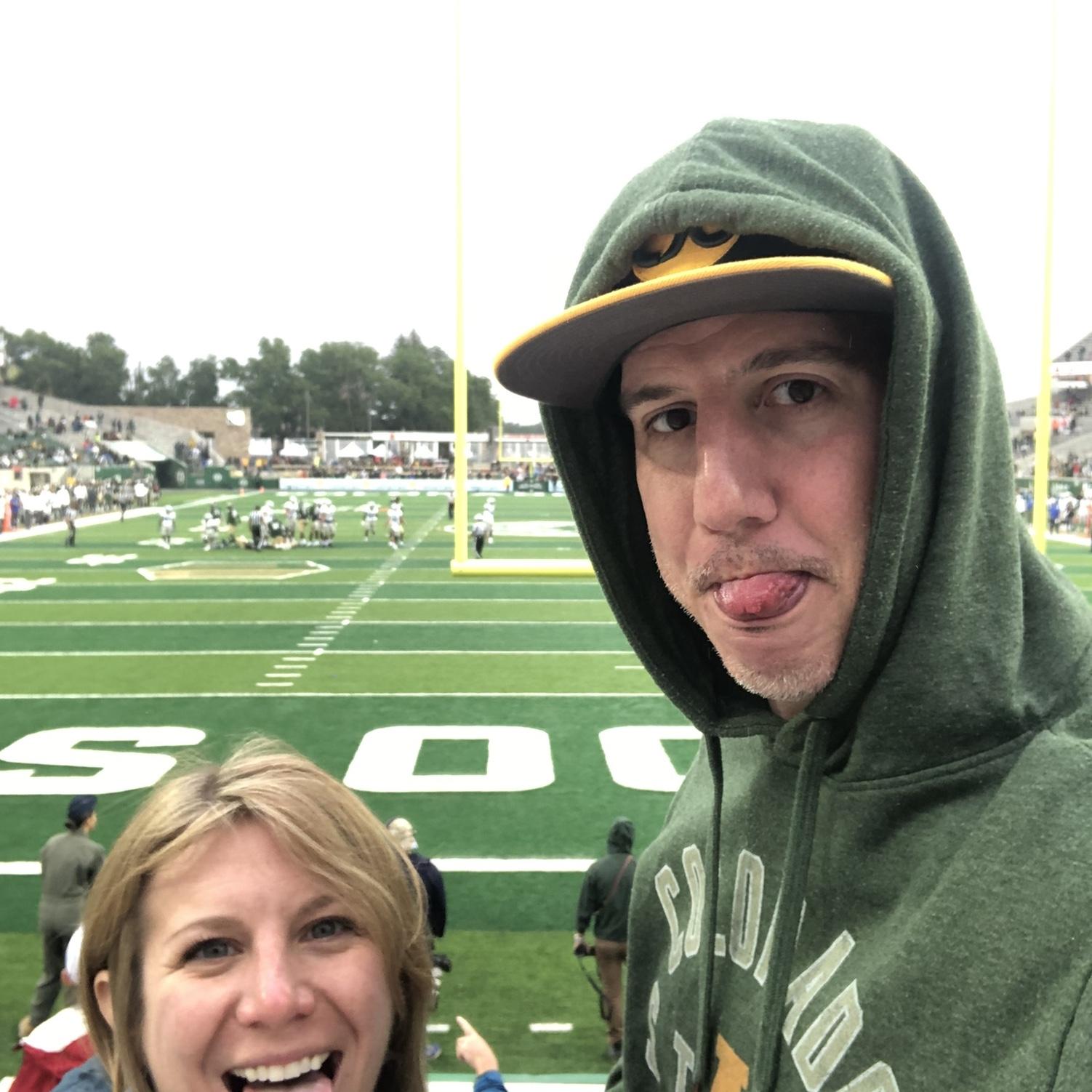 Our first photo together at a drizzly CSU game