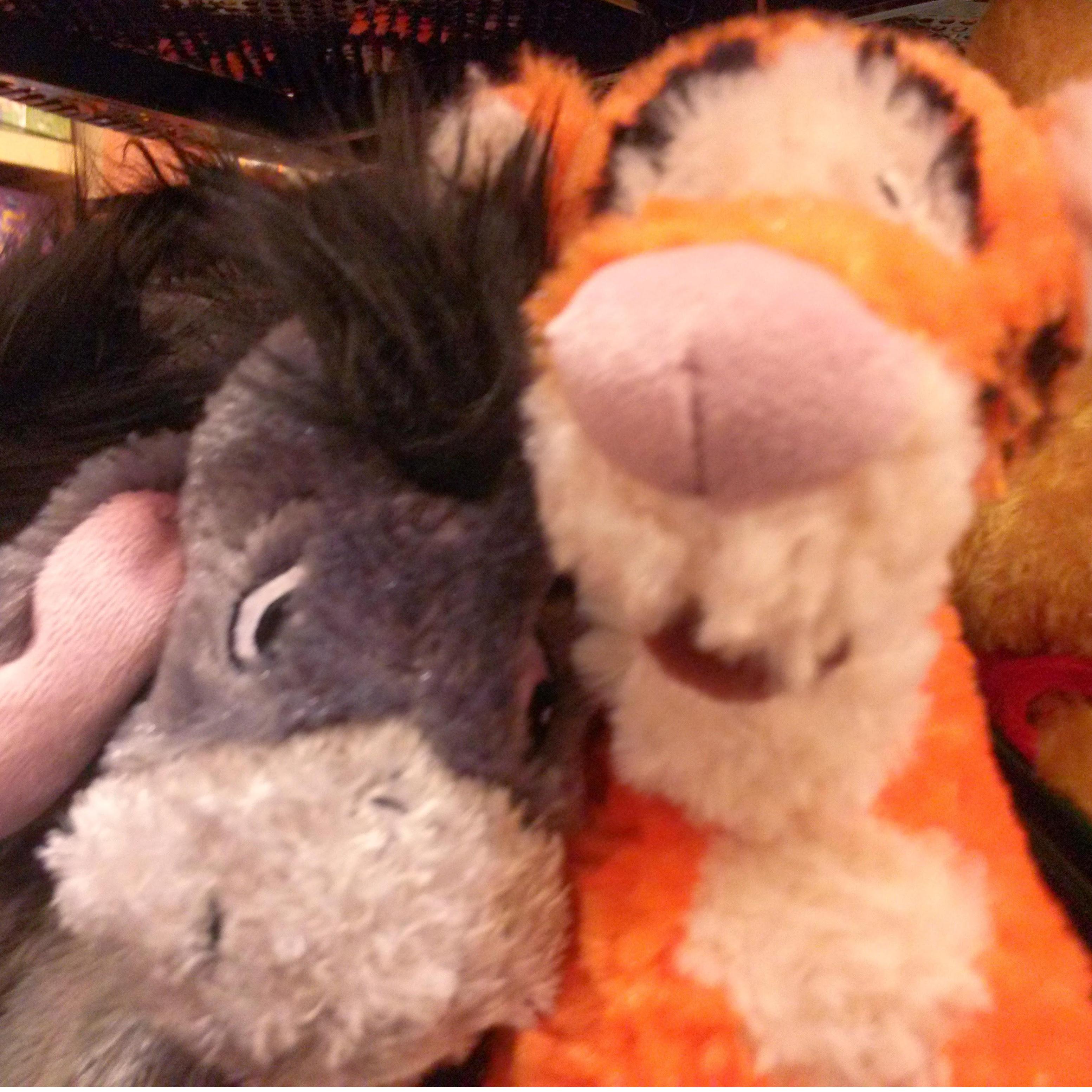 Our Winnie the Pooh personas cuddling together