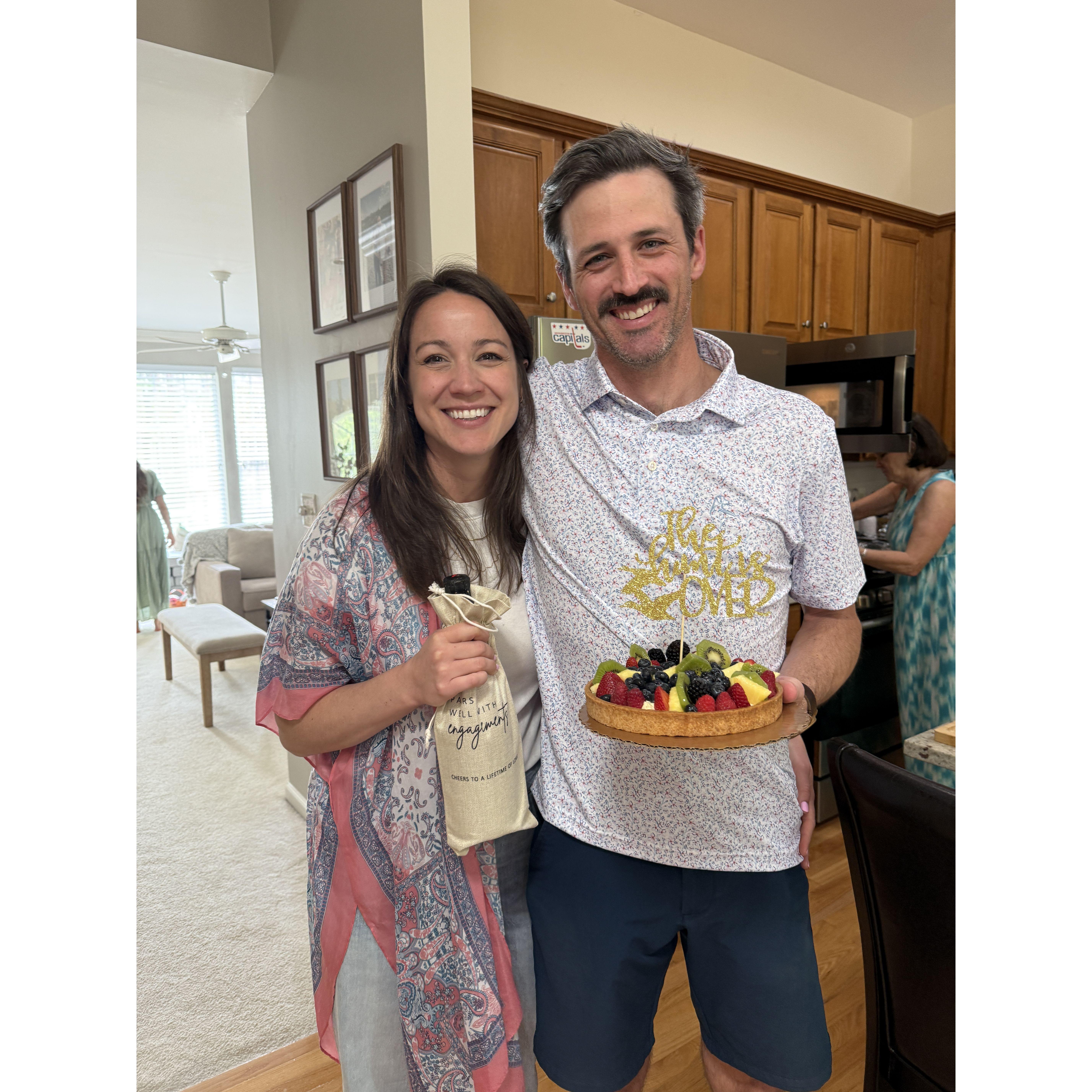 Celebrating their engagement. "The hunt is over."