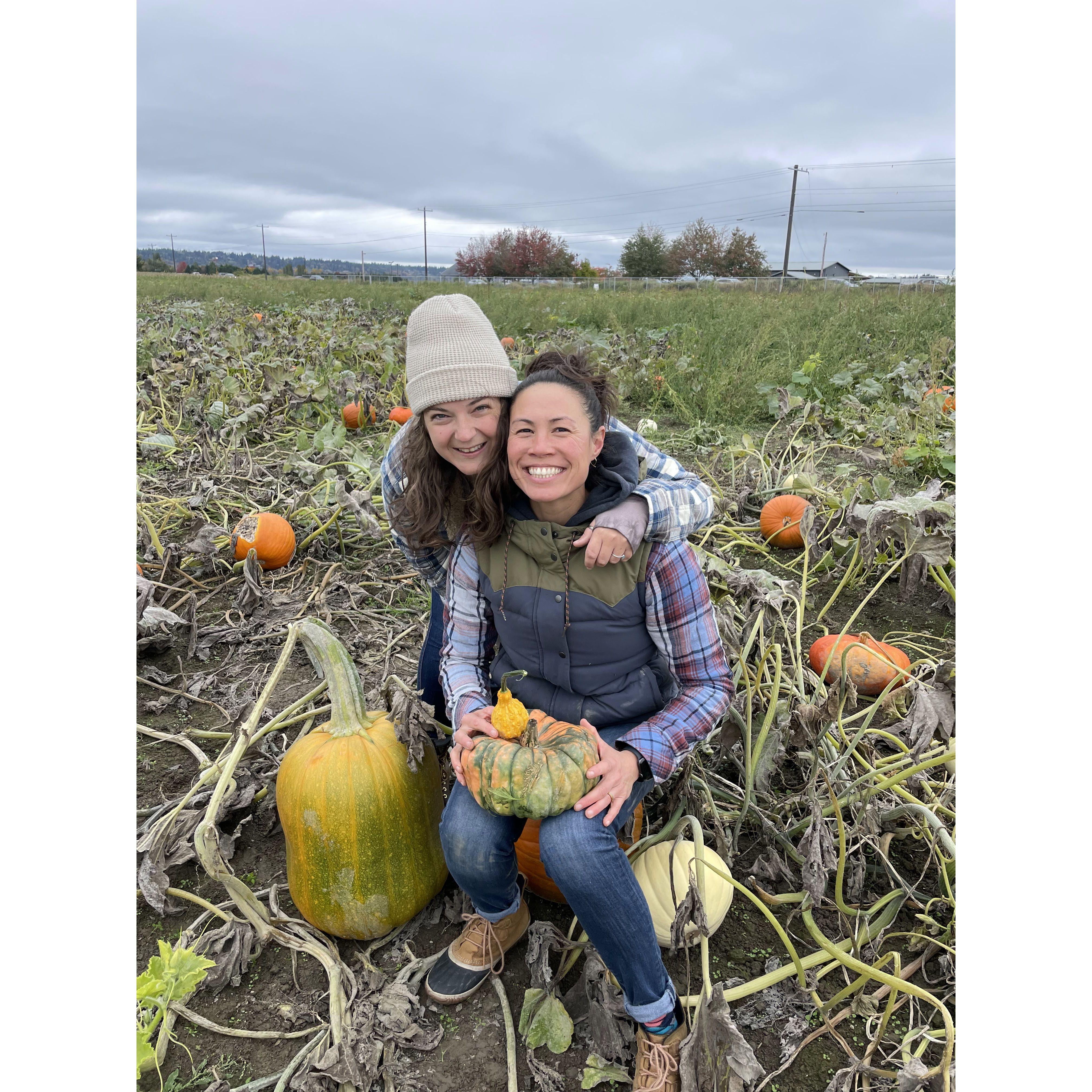 Look at how cute Liz is with her pumpkins