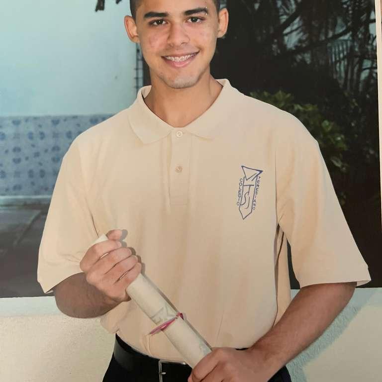 Jose's high school graduation photo