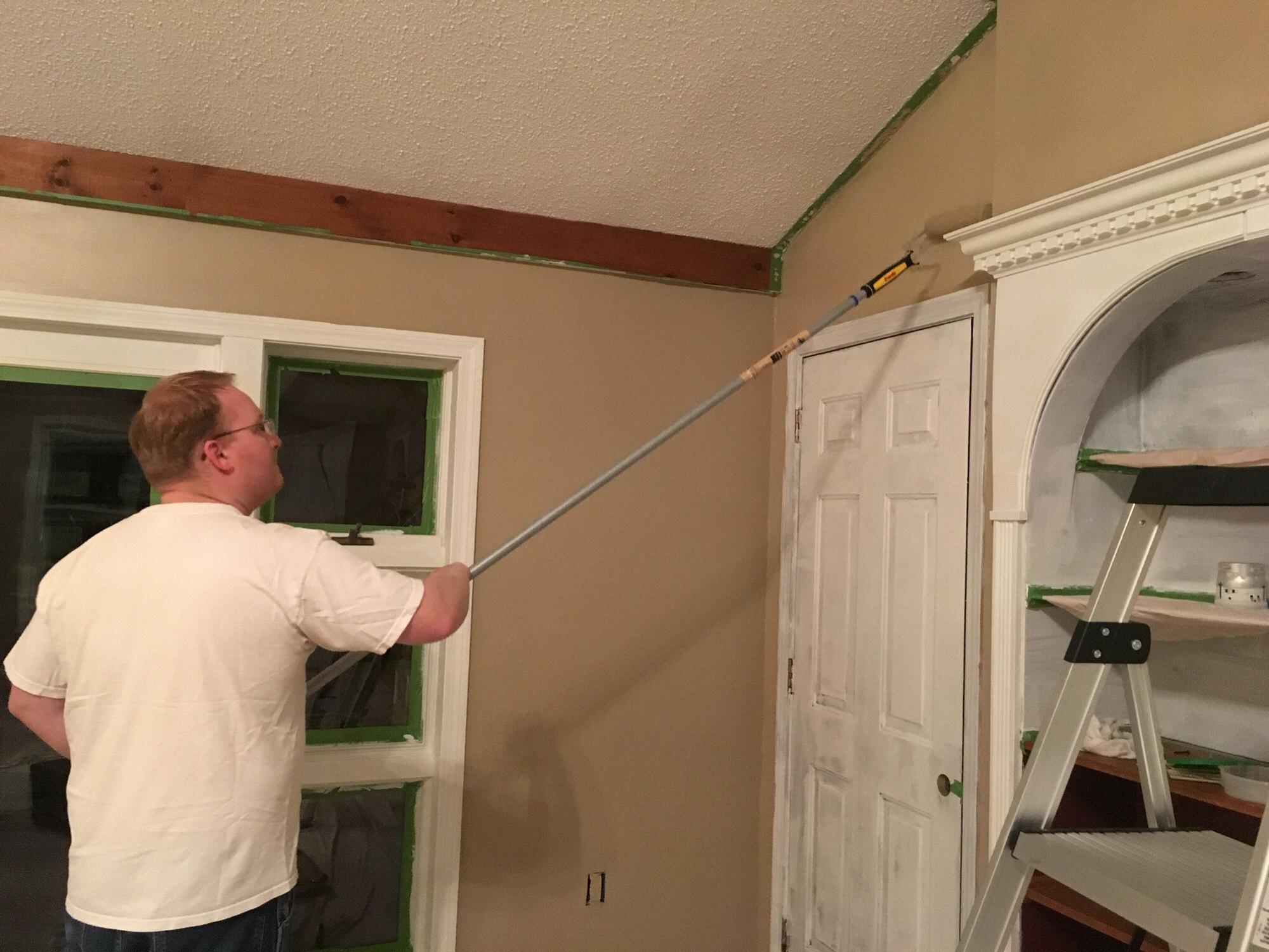 Putting the finishing touches on the living room.