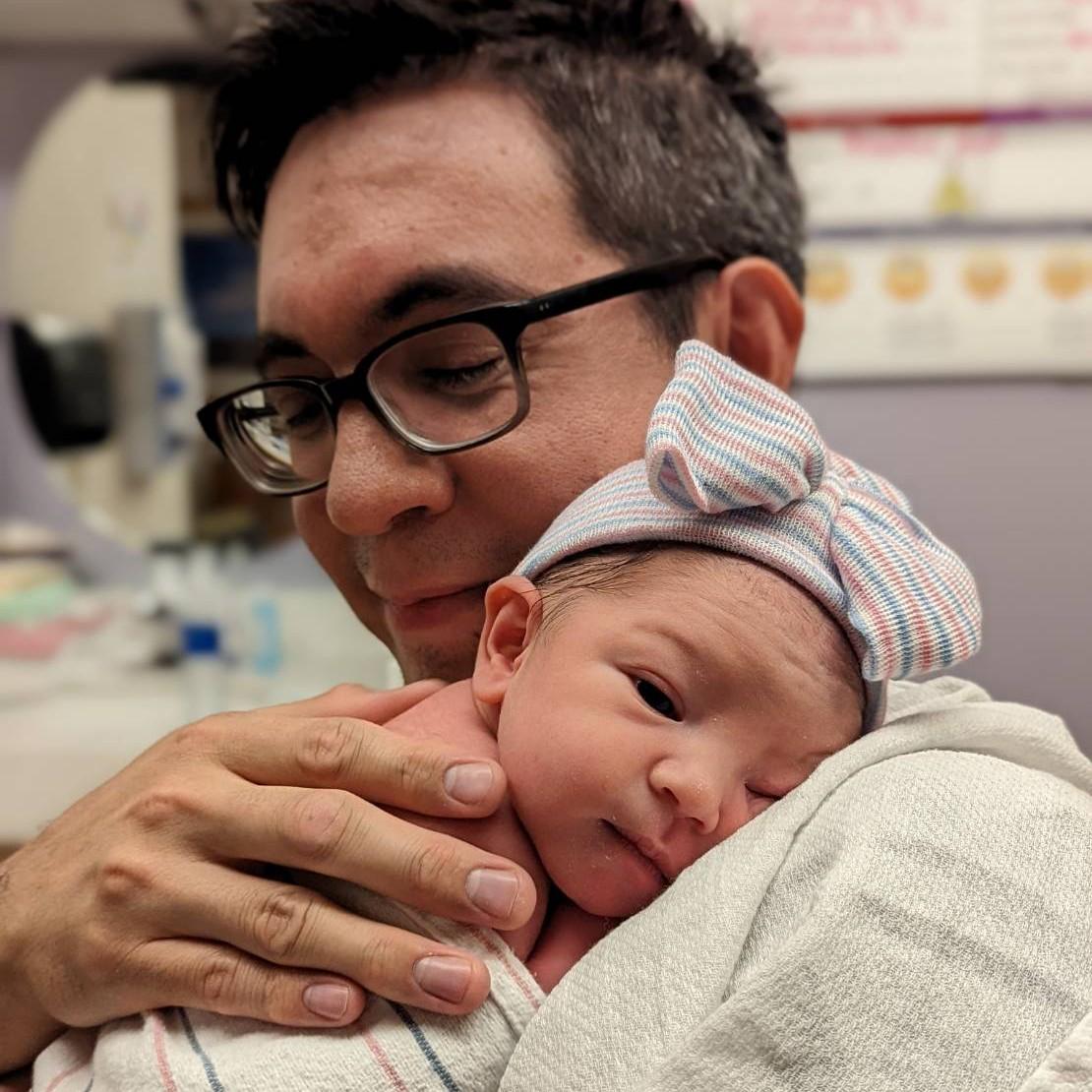 A happy daddy as Charlotte gets used to breathing air for the first time.
