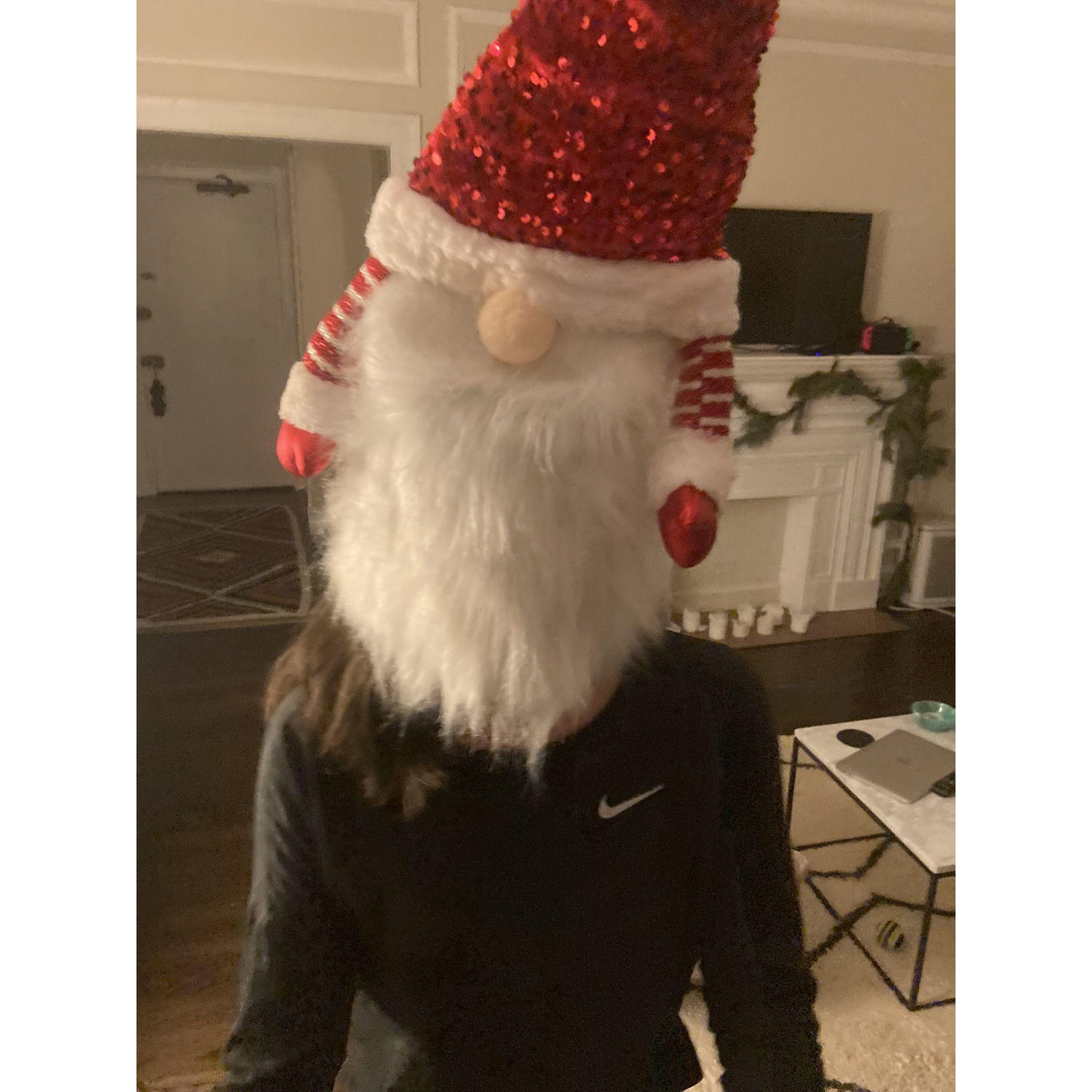 Our holiday tree topper fits quite nicely over Sarah's head. She is considering it for the wedding.