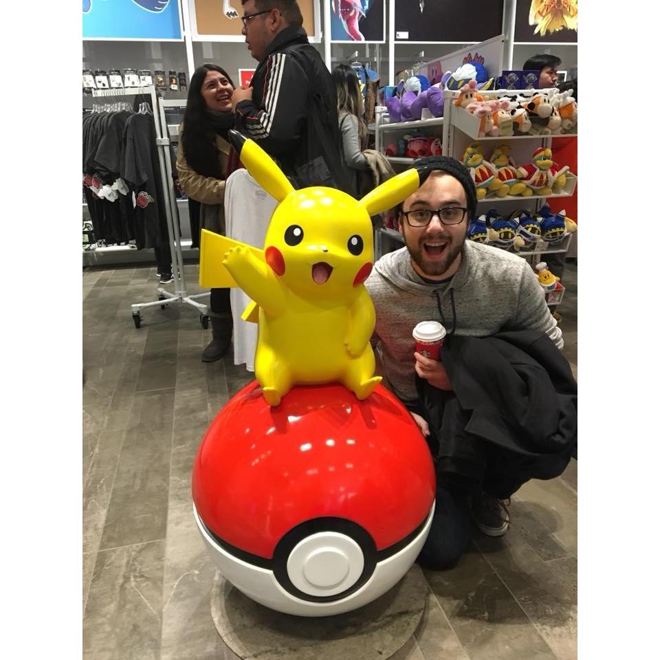 Eric geeking out at his favorite store on earth