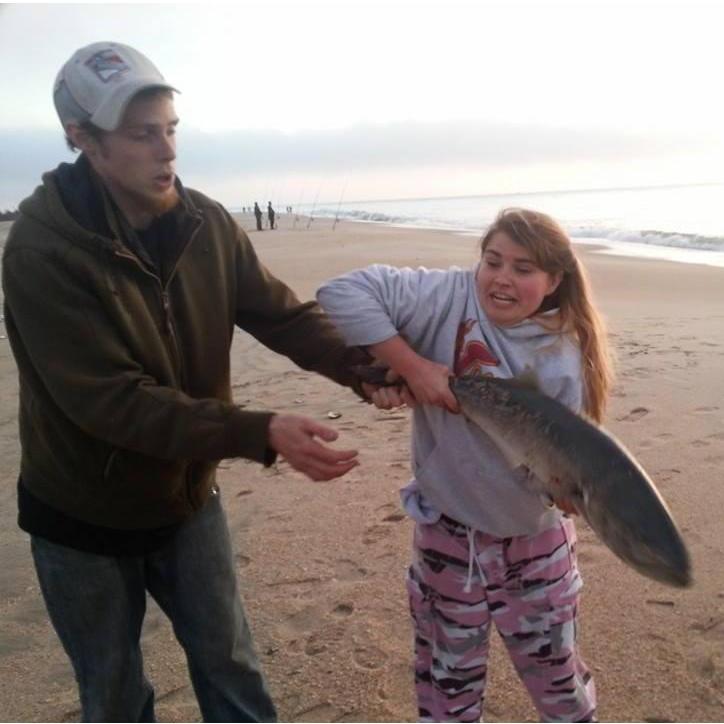 Overnight fishing trip in New Jersey. This was Amanda's best attempt at not dropping the fish when it started flopping all over the place!