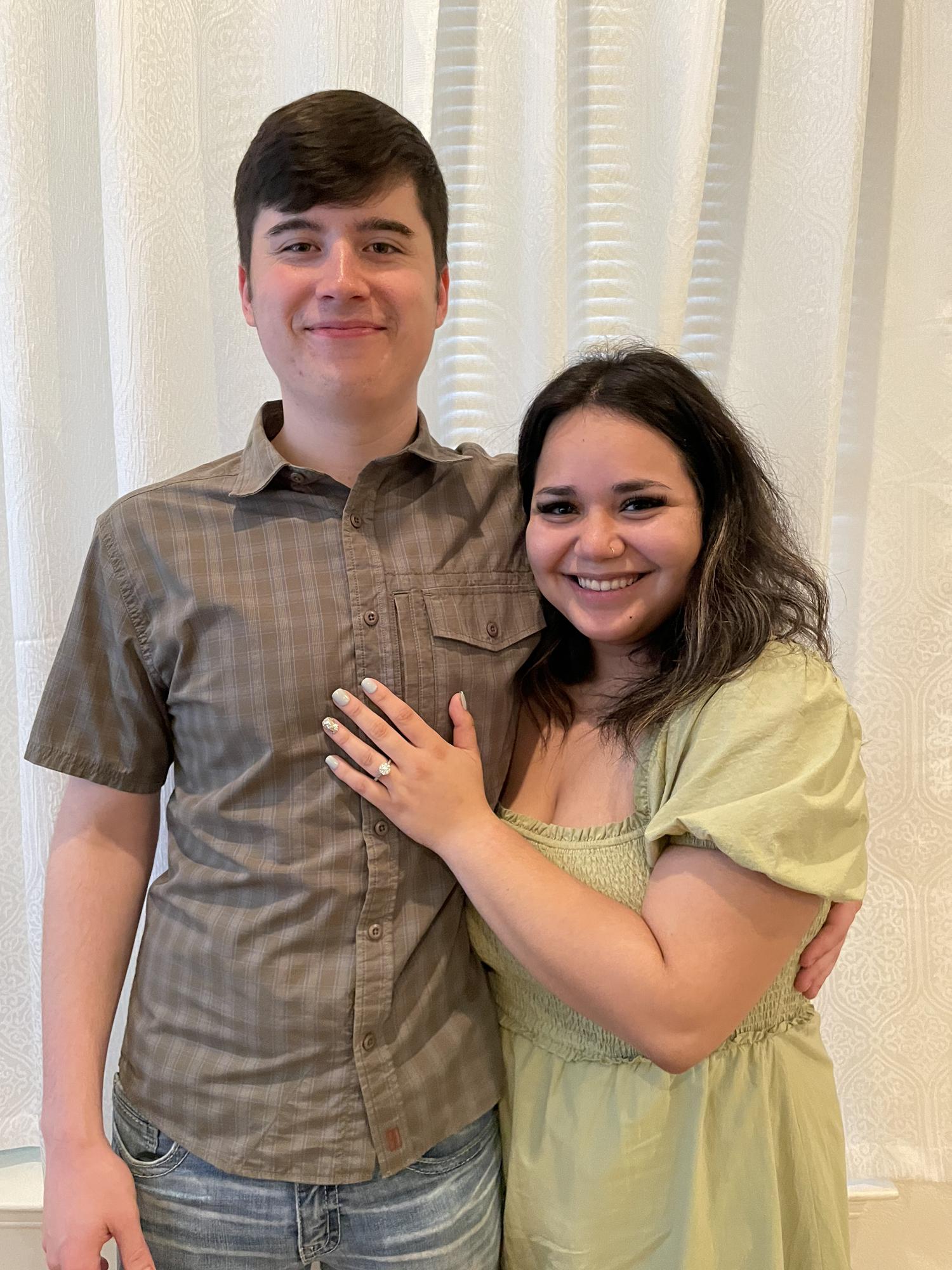 she said yes! 
Jonah was so excited to propose he had the ring for an afternoon and got on one knee.