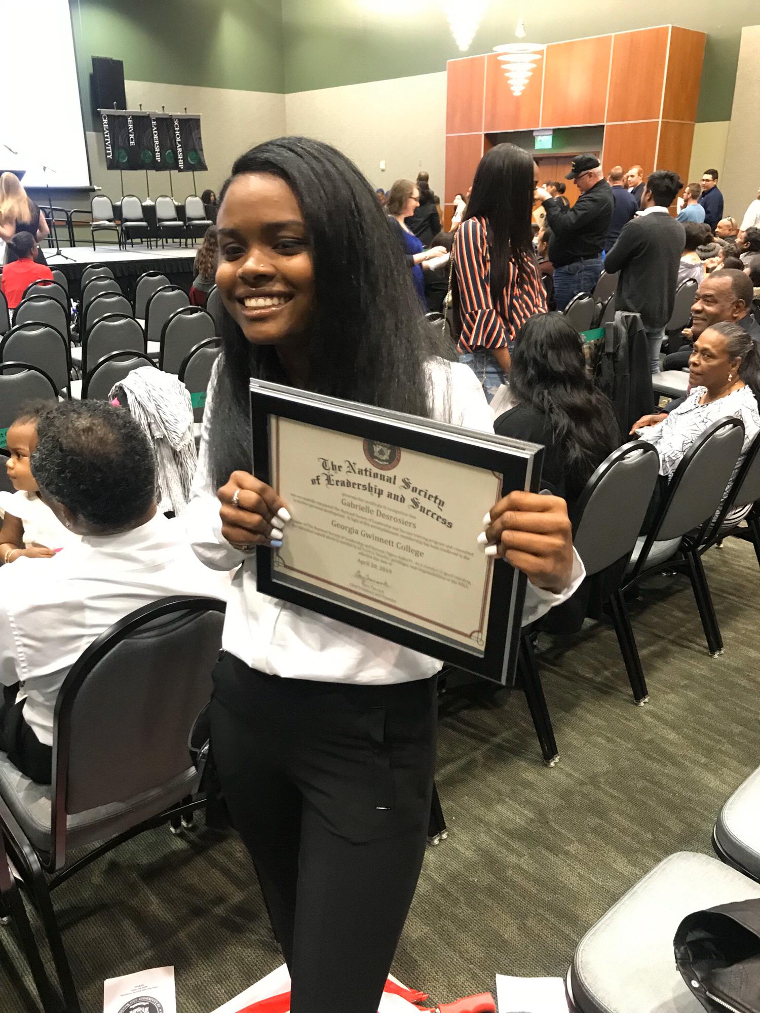 Gabrielle inducted into the National Honor Society with high ranking for academics at Gwinnett College