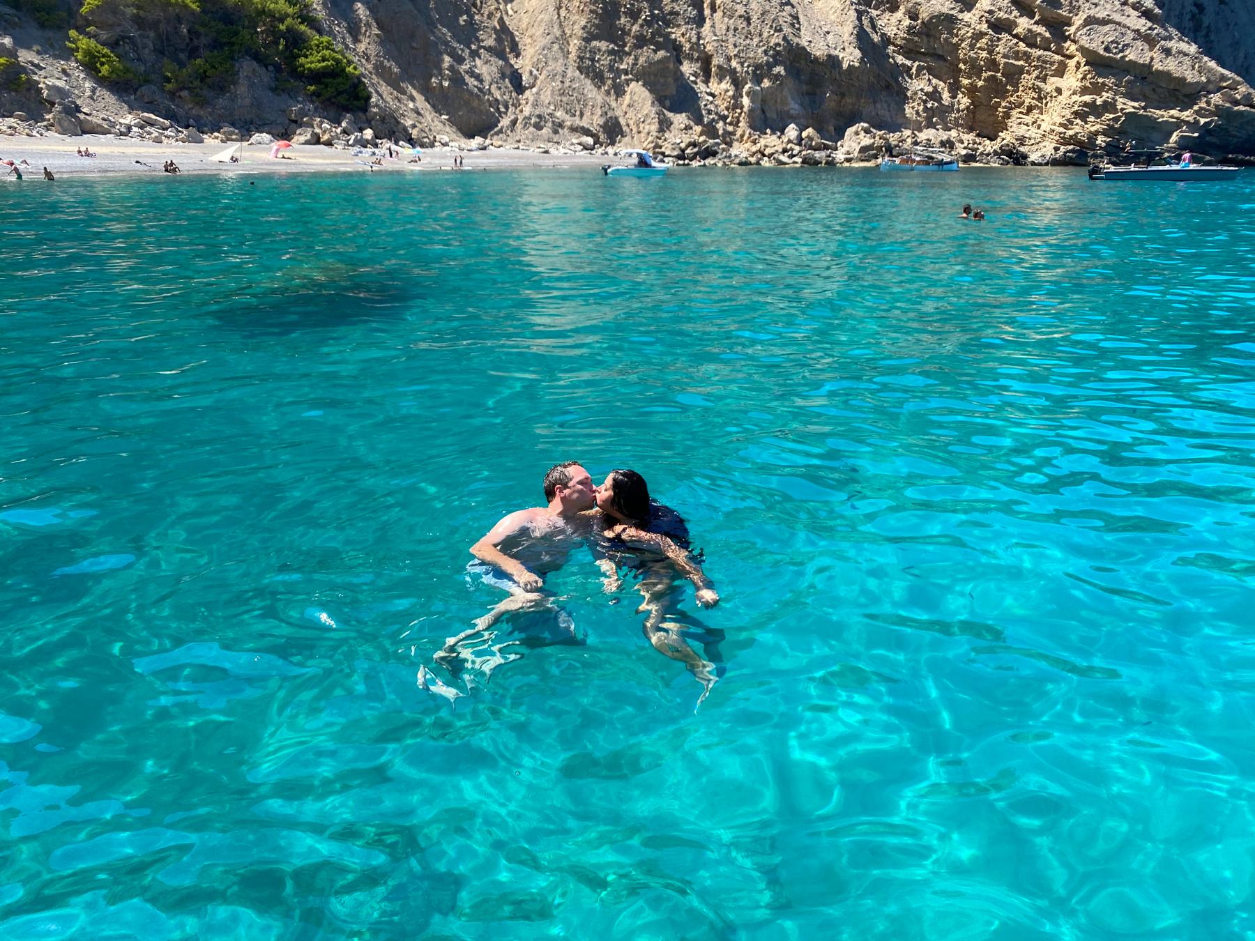 The day after our engagement, we took a boat ride and got to swim in the bluest of waters!