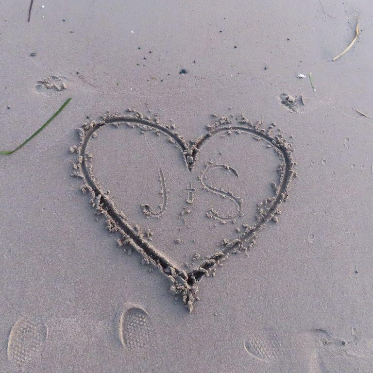 J+S in the sand