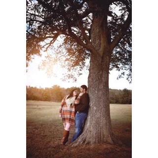 Taking our engagement pictures at the pumpkin patch was such a fun idea. This tree had the perfect lighting, but we had to watch for shooting corn.