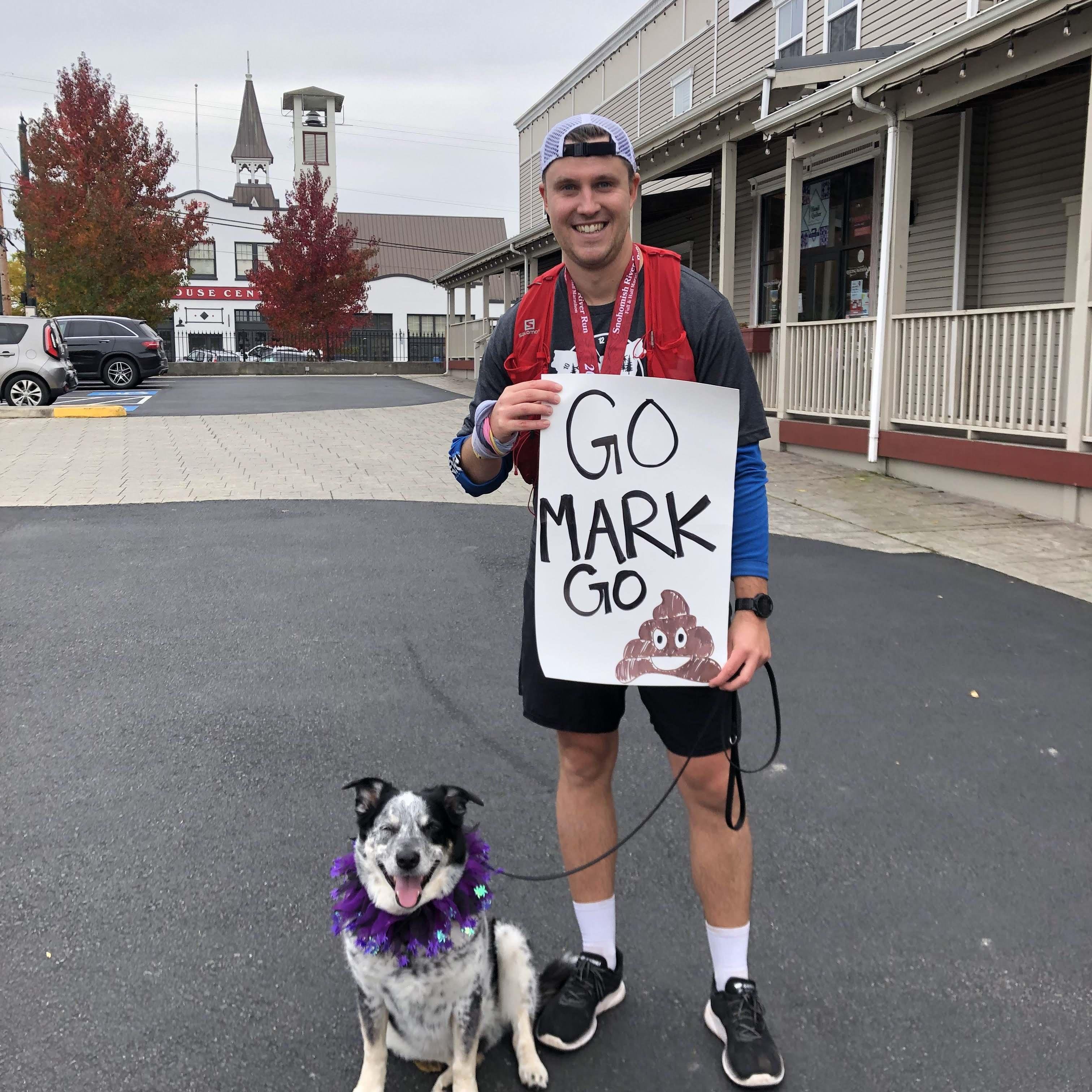 Mark and Bruno at the finish line of Mark's first marathon. Snohomish, Washington. October 2021.