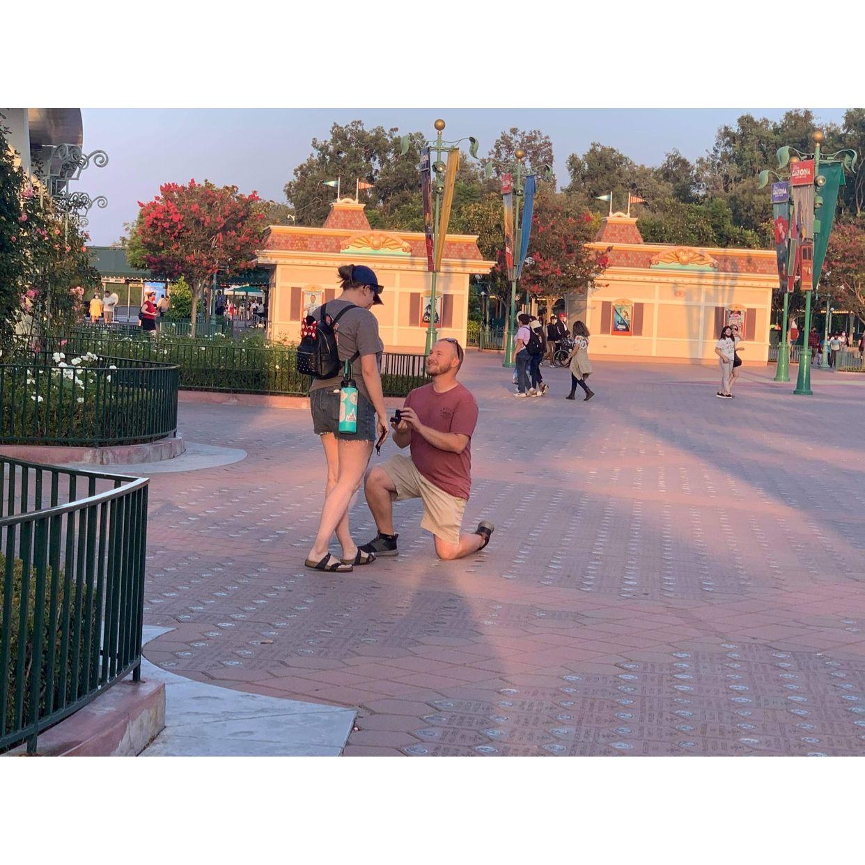 This is the moment when Weston asked Katie to marry him. A wonderful bystander caught this exact moment for us we are so happy we have a picture of it.